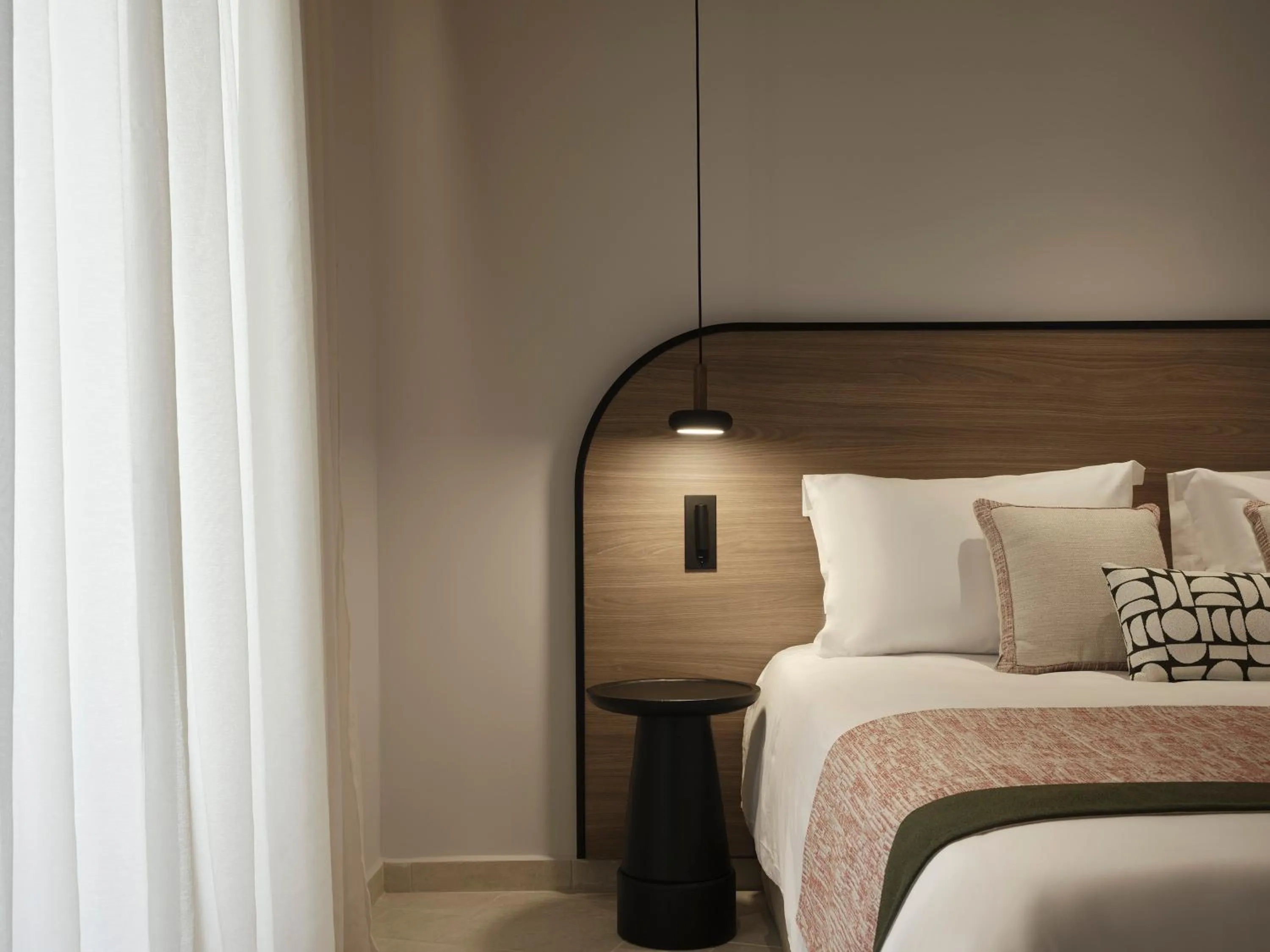 Bed in NAUMA PAROS Design Boutique Hotel