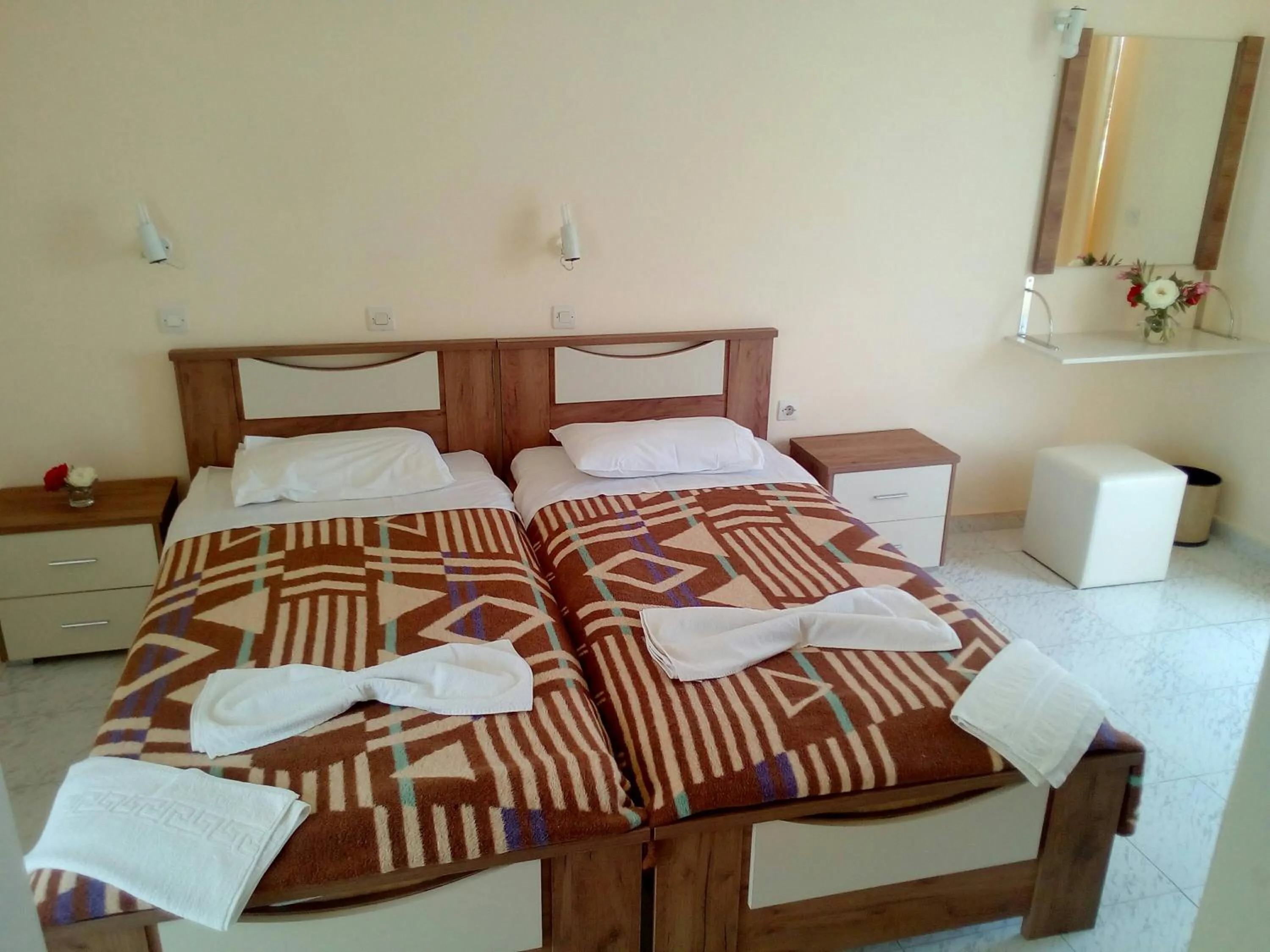 Bed in Leonidas Hotel & Studios