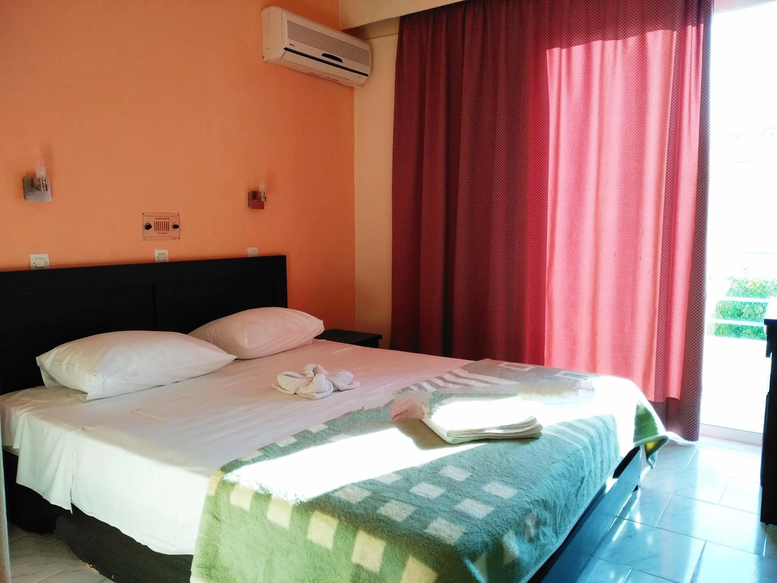 Photo of the whole room, Bed in Leonidas Hotel & Studios