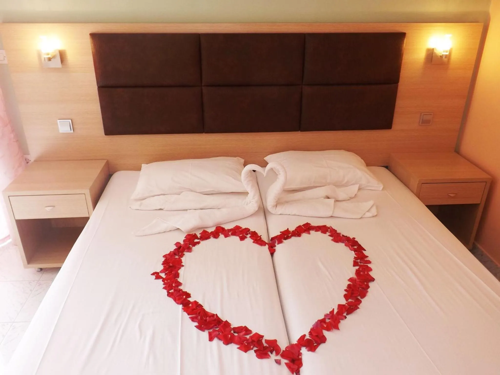 Bed in Leonidas Hotel & Studios