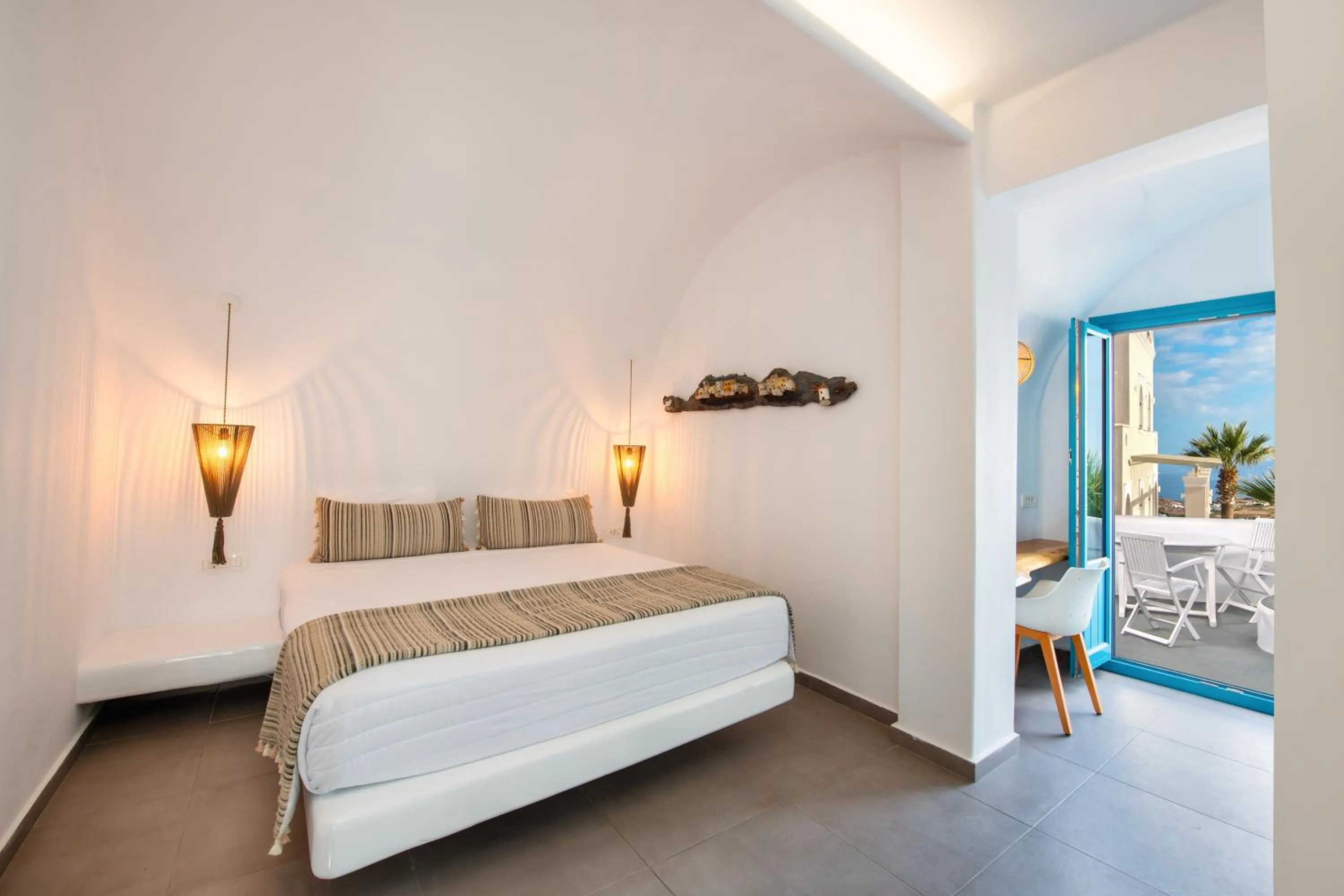 Bed in Evgenia Villas & Suites by Calm Collection