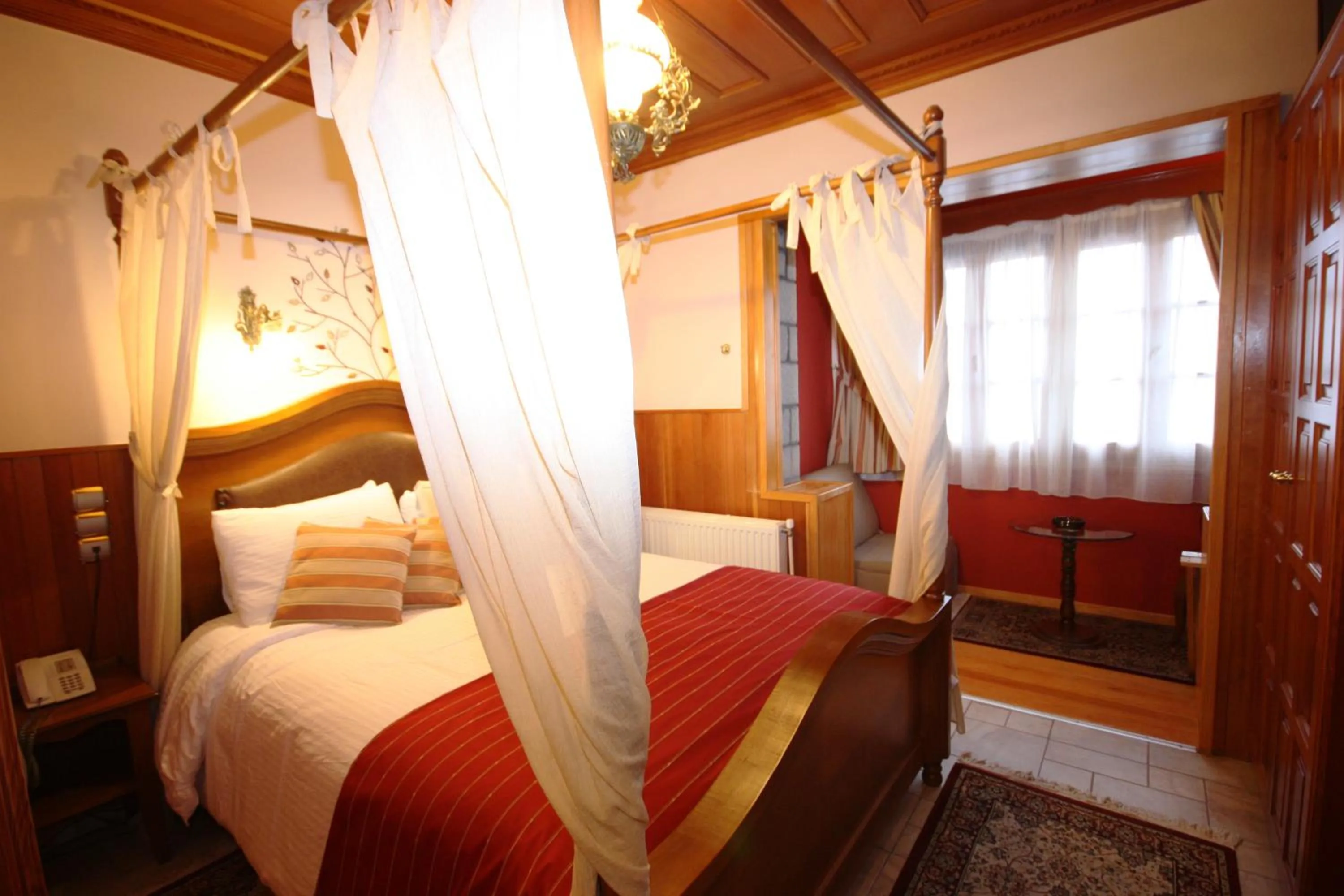 Photo of the whole room, Bed in Archontiko Metsovou Luxury Boutique Spa Hotel