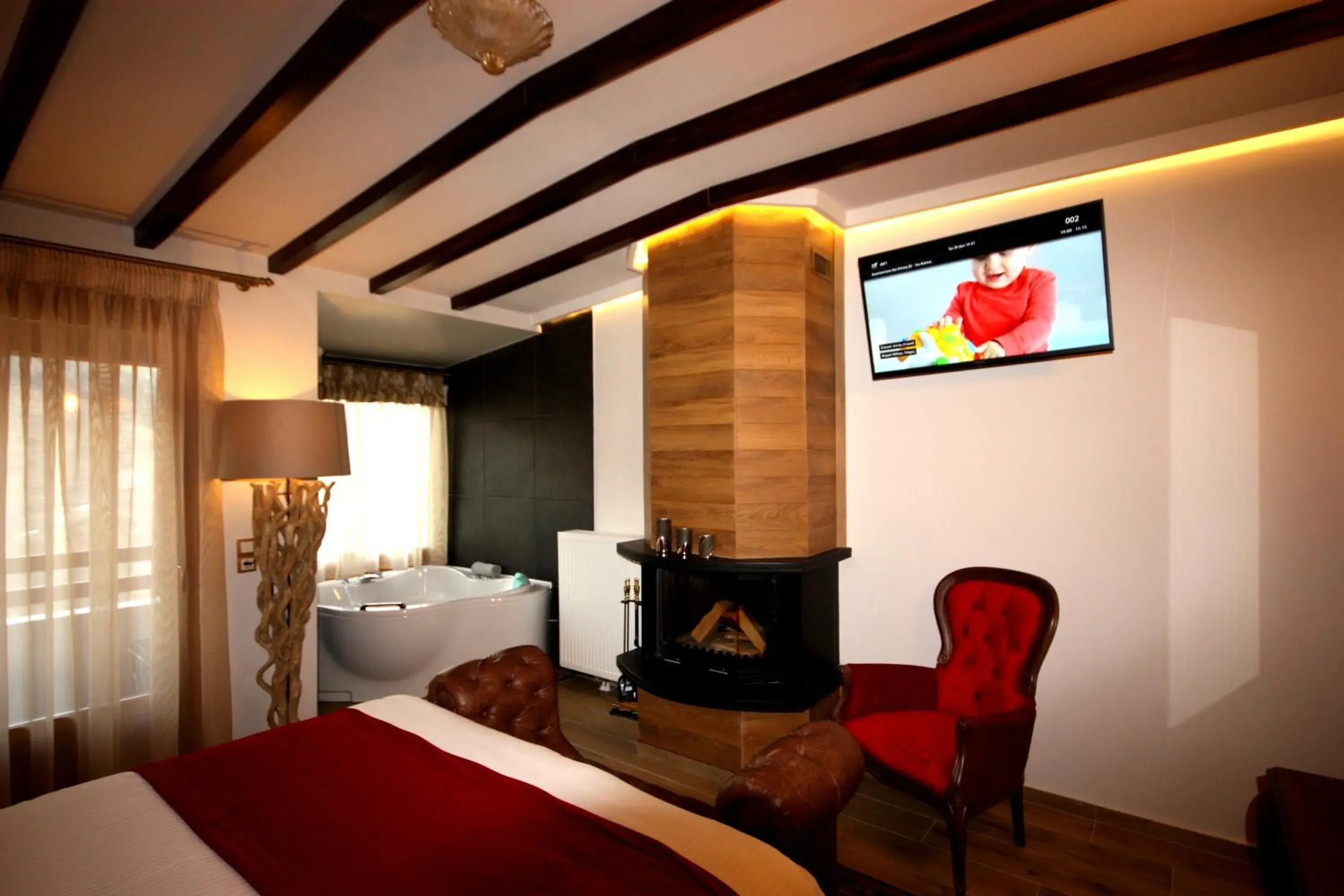 Photo of the whole room, Bed in Archontiko Metsovou Luxury Boutique Spa Hotel Photo of the whole room, Bed in Archontiko Metsovou Luxury Boutique Spa Hotel