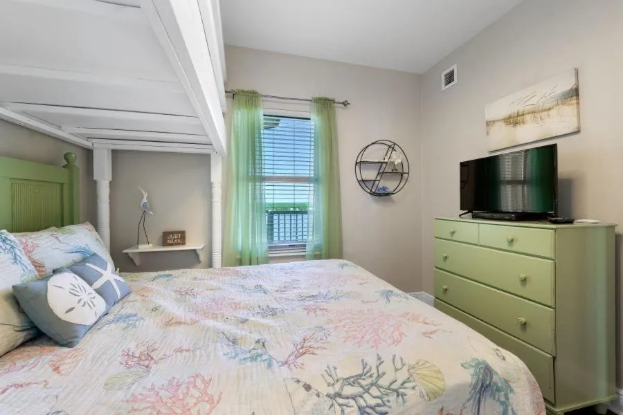 Bed in Crystal Tower 1308 by Youngs Suncoast