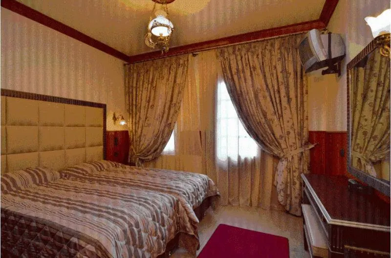 Bed in Hotel Apollon