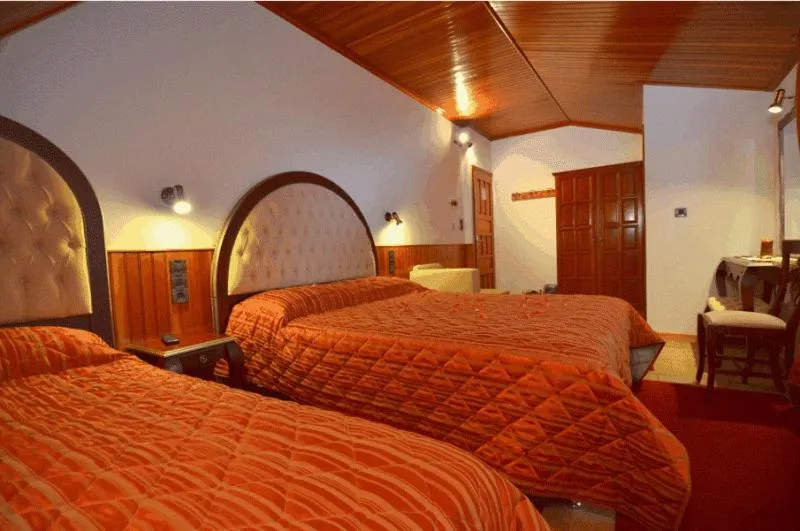 Bed in Hotel Apollon