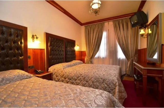 Bed in Hotel Apollon