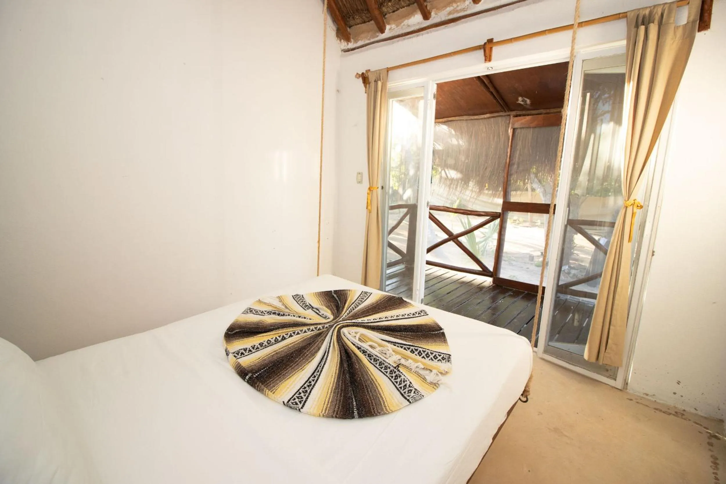 Bed in Hotel Ak'Na Holbox