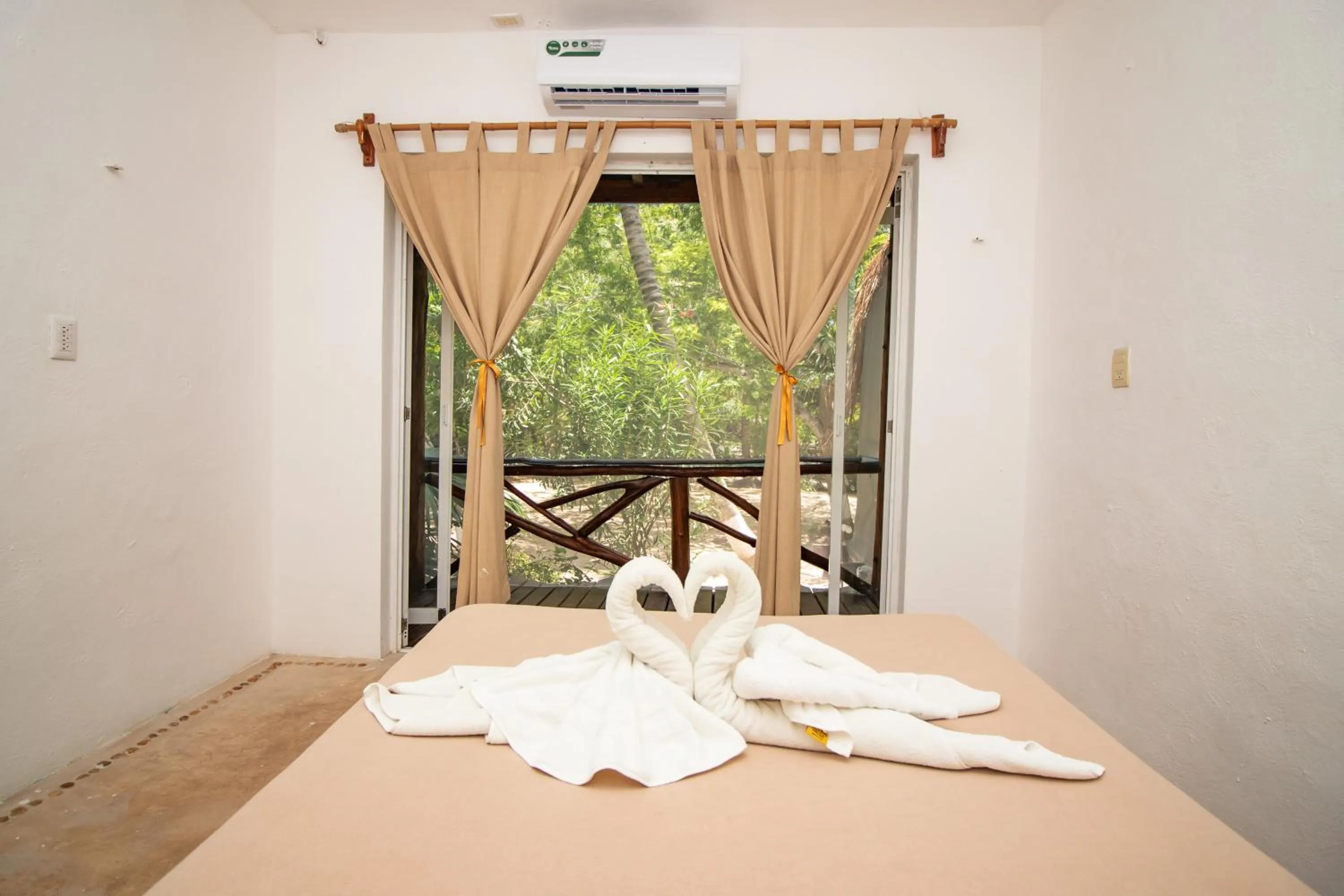 Bedroom in Hotel Ak'Na Holbox