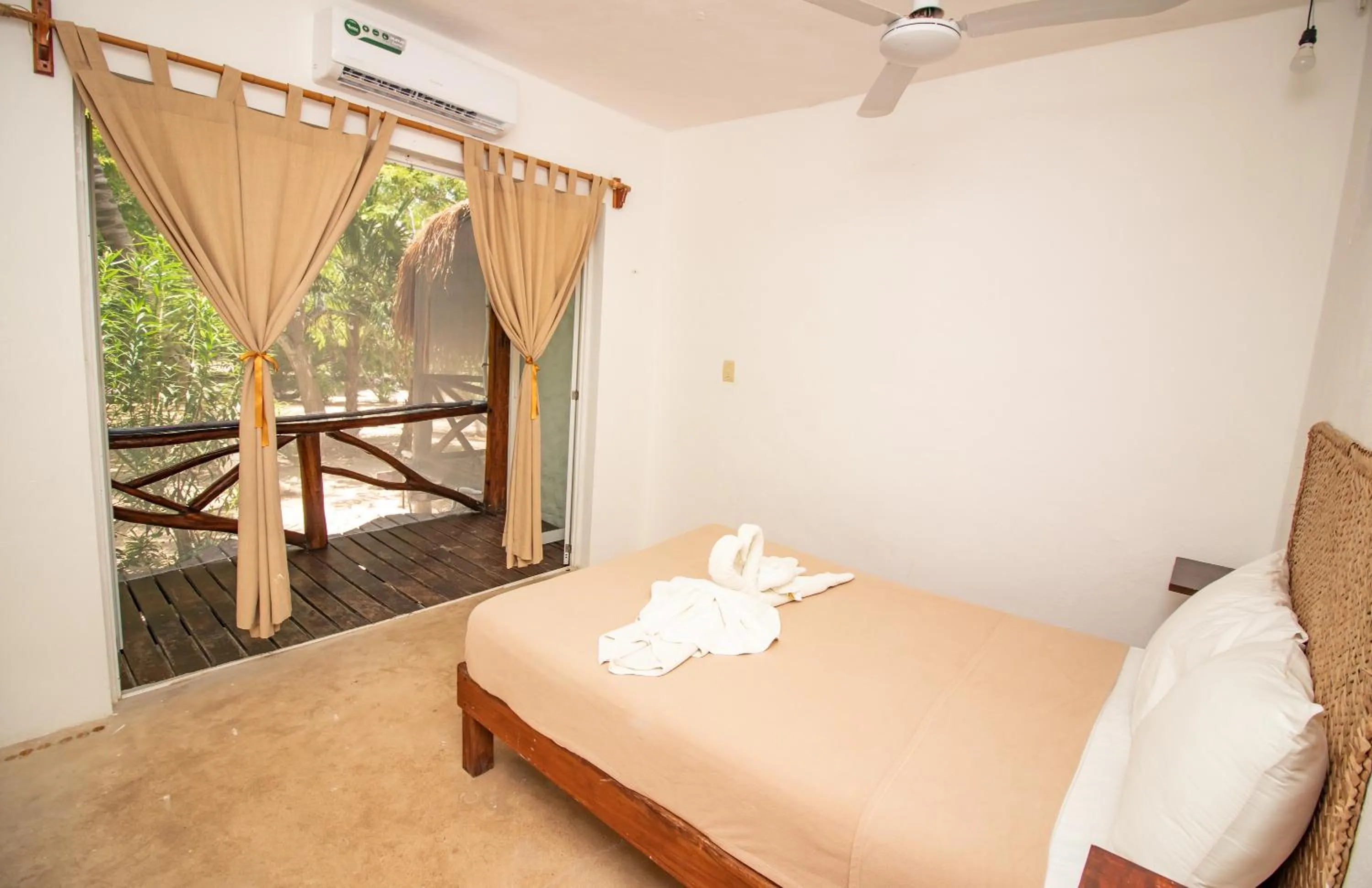 Bedroom, Bed in Hotel Ak'Na Holbox