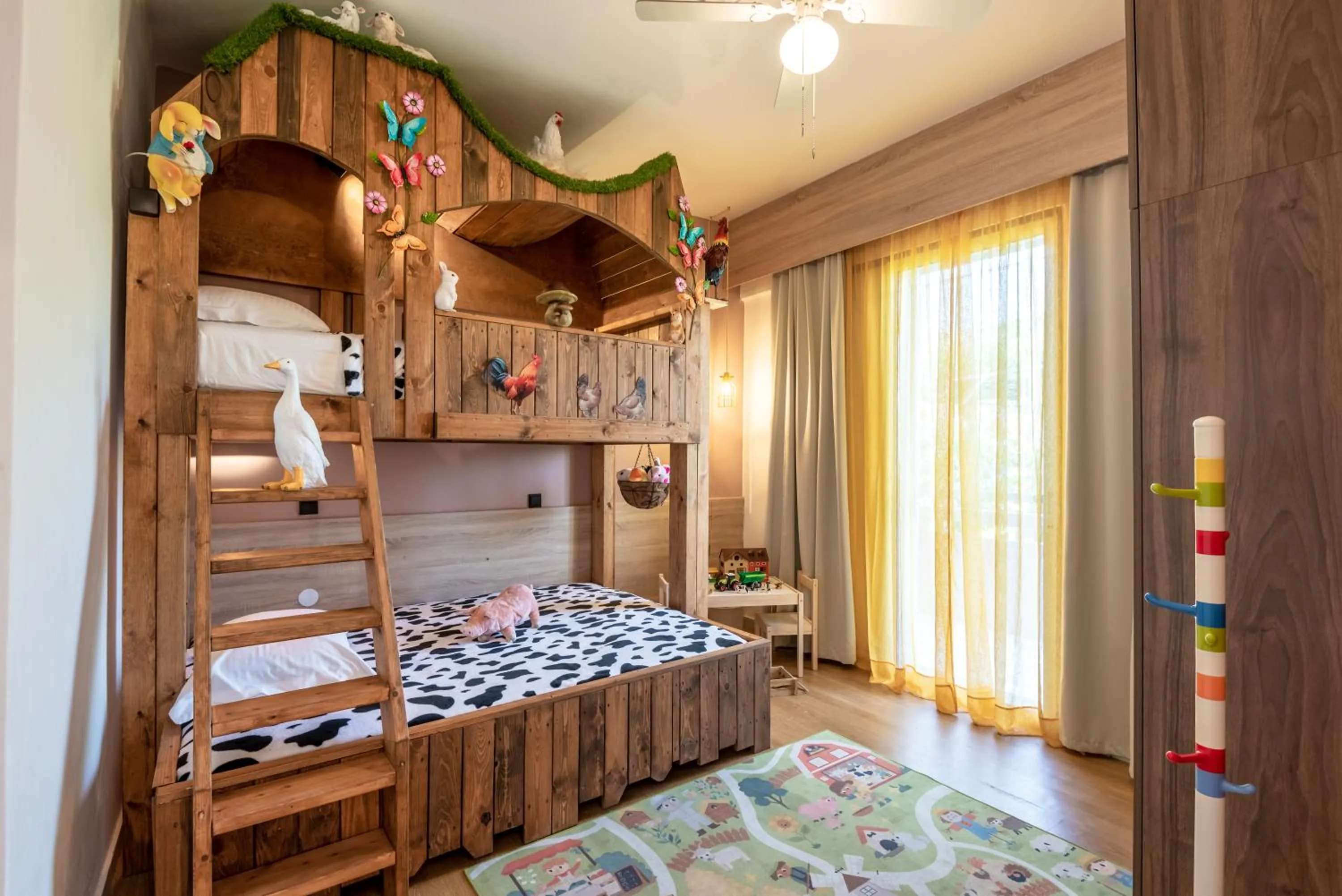 Bed in Paradisio Baby & Kinder Apartments