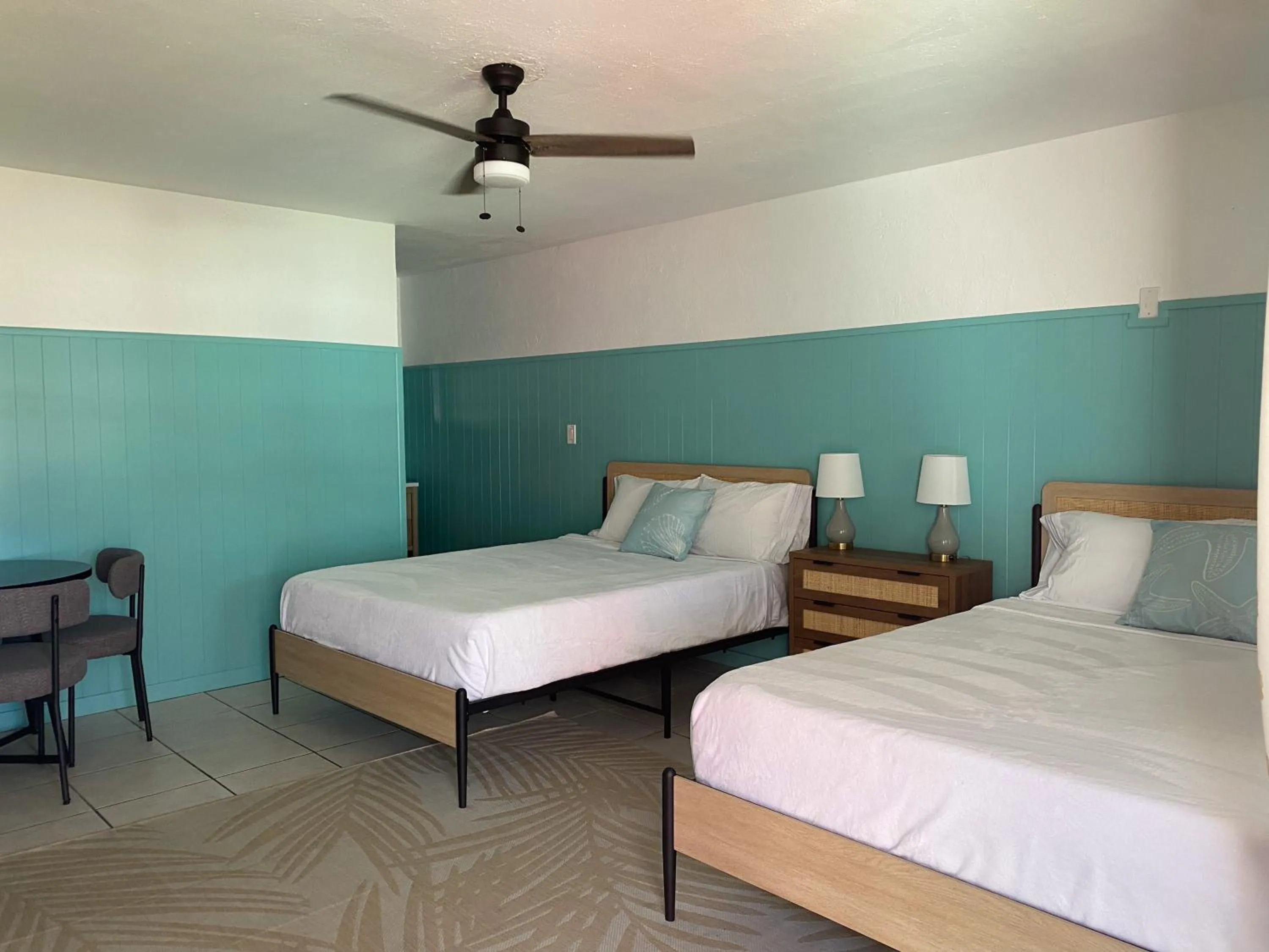 Bed in Oasis Palms Resort