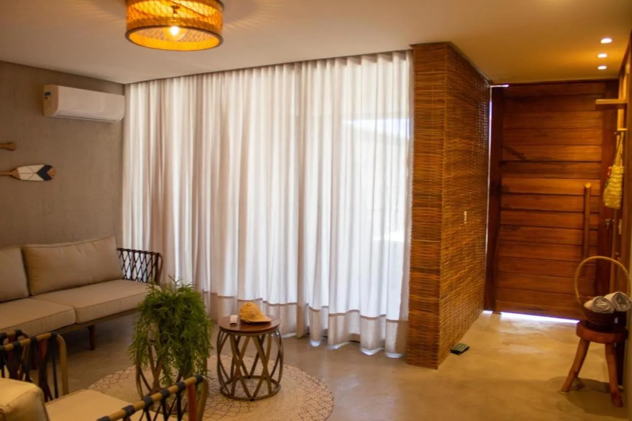 Living room in Temporada Areia e Mar Triplex com piscina privativa e área gourmet a 250m da Praia do Patacho
