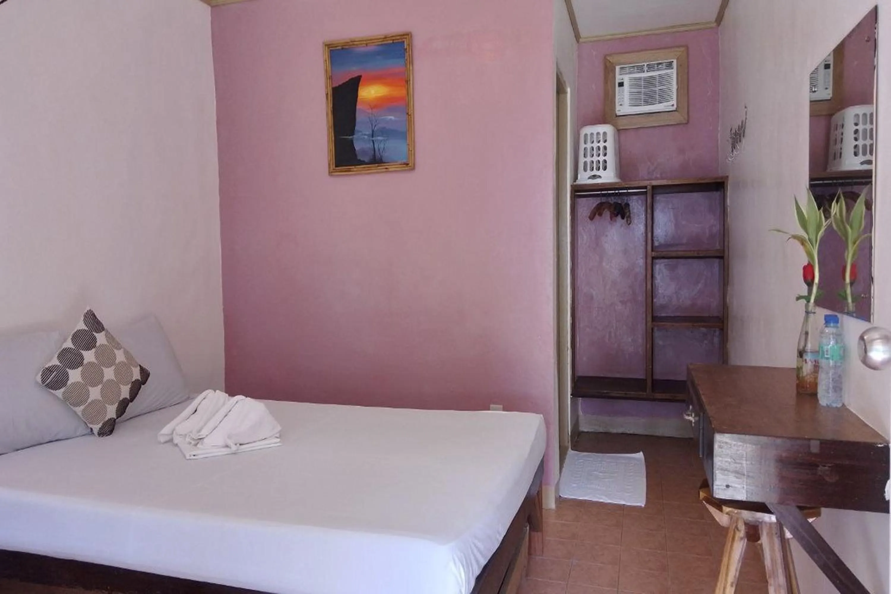 Bed in Summer Homes Beach Front Resort and Cottages Port Barton