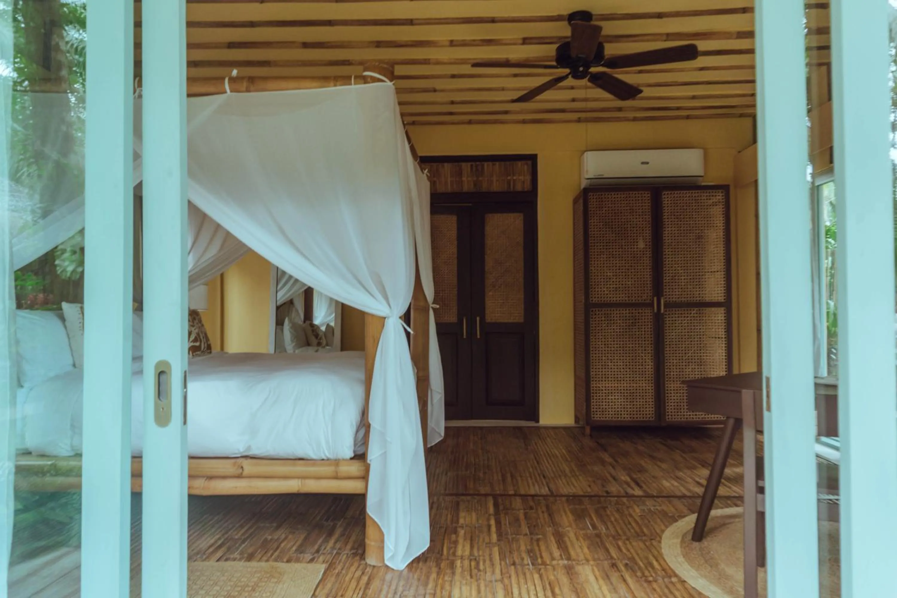 Photo of the whole room, Bed in INARA Siargao
