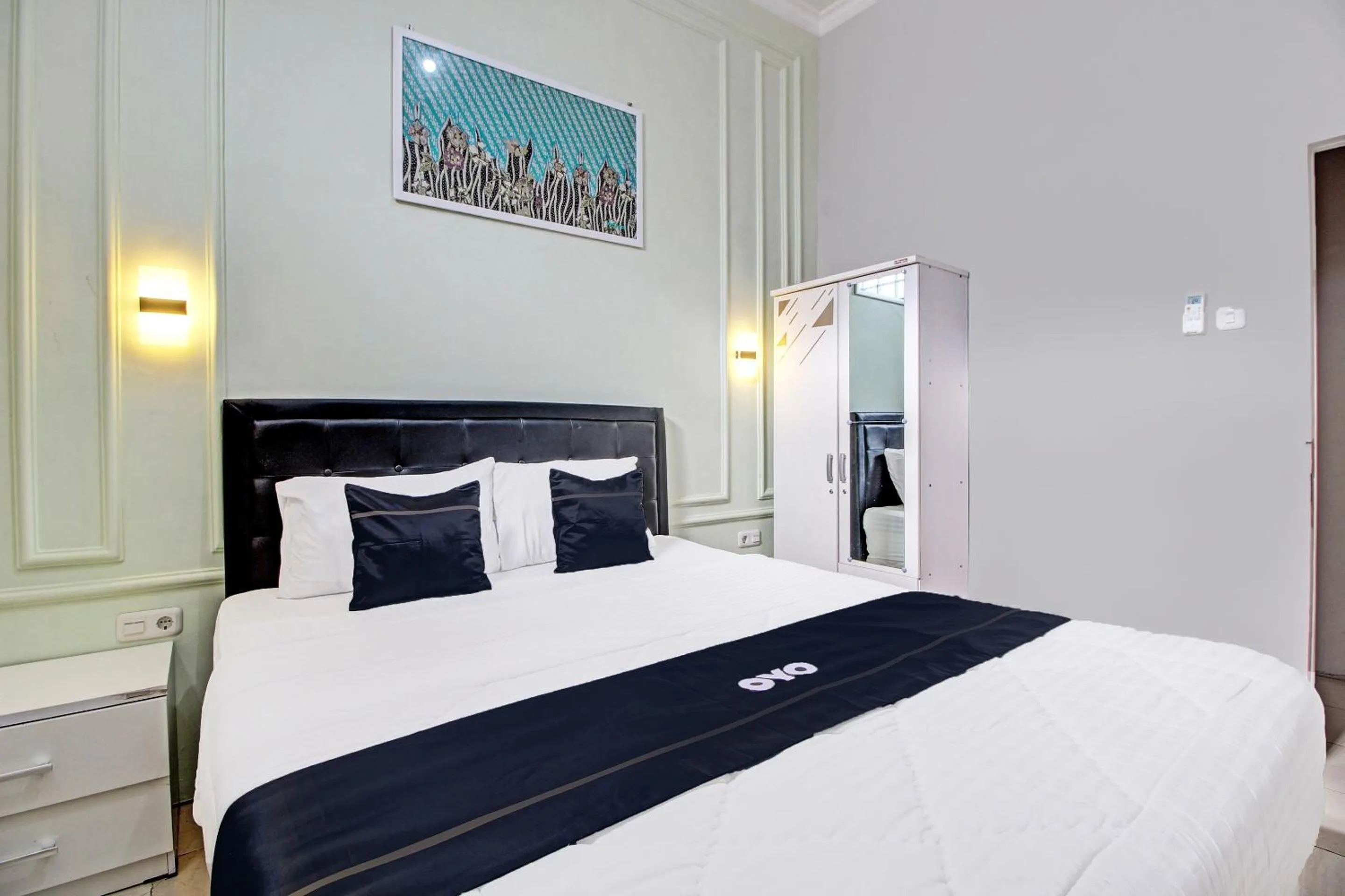 Bedroom in Capital O 92250 Hall & Guesthouse Kowapi Syariah