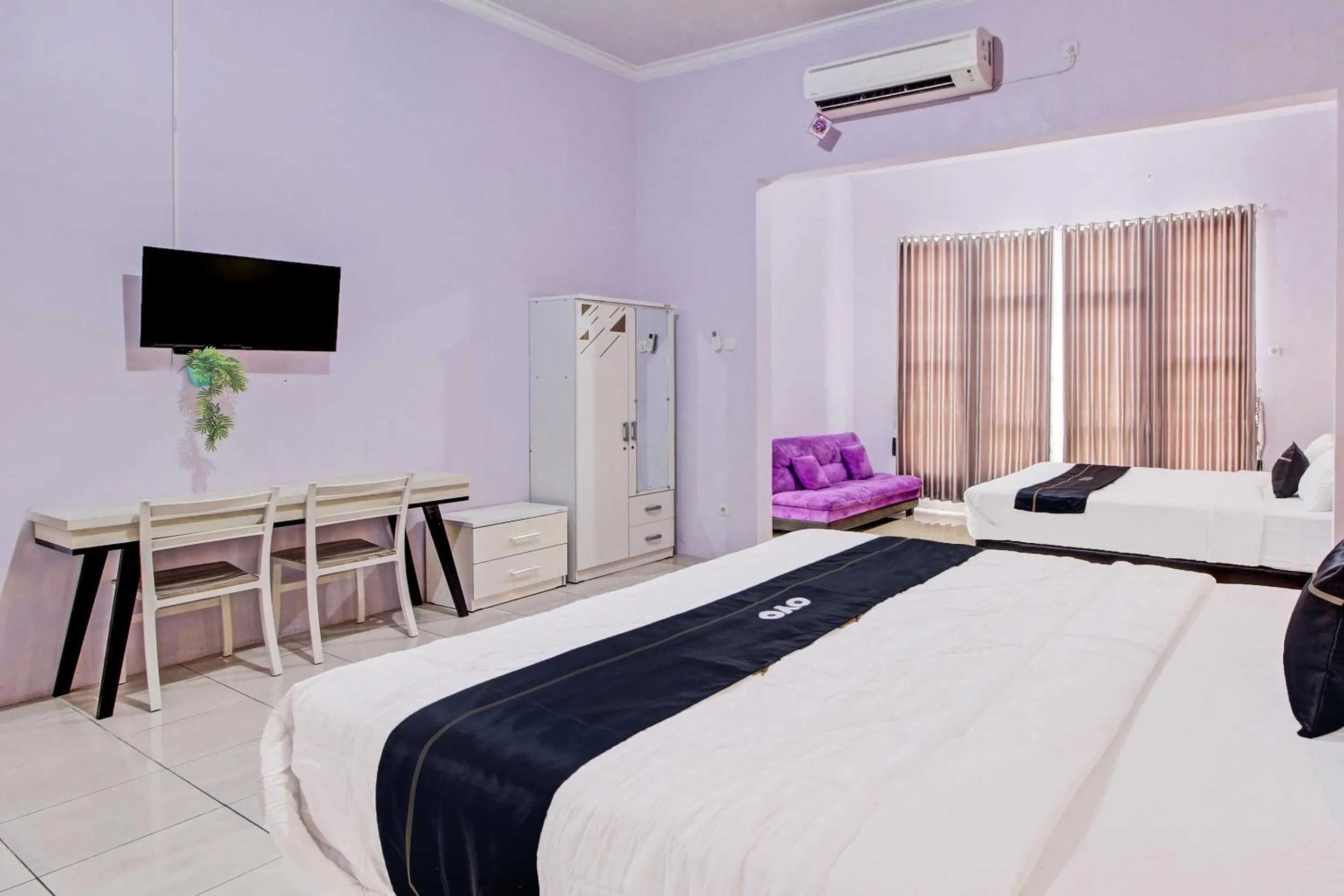 Bedroom in Capital O 92250 Hall & Guesthouse Kowapi Syariah