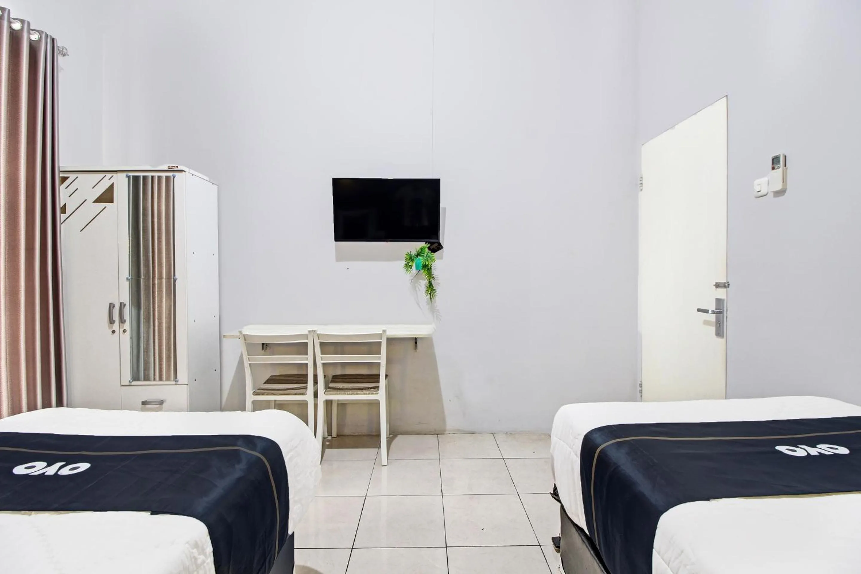 Bedroom in Capital O 92250 Hall & Guesthouse Kowapi Syariah