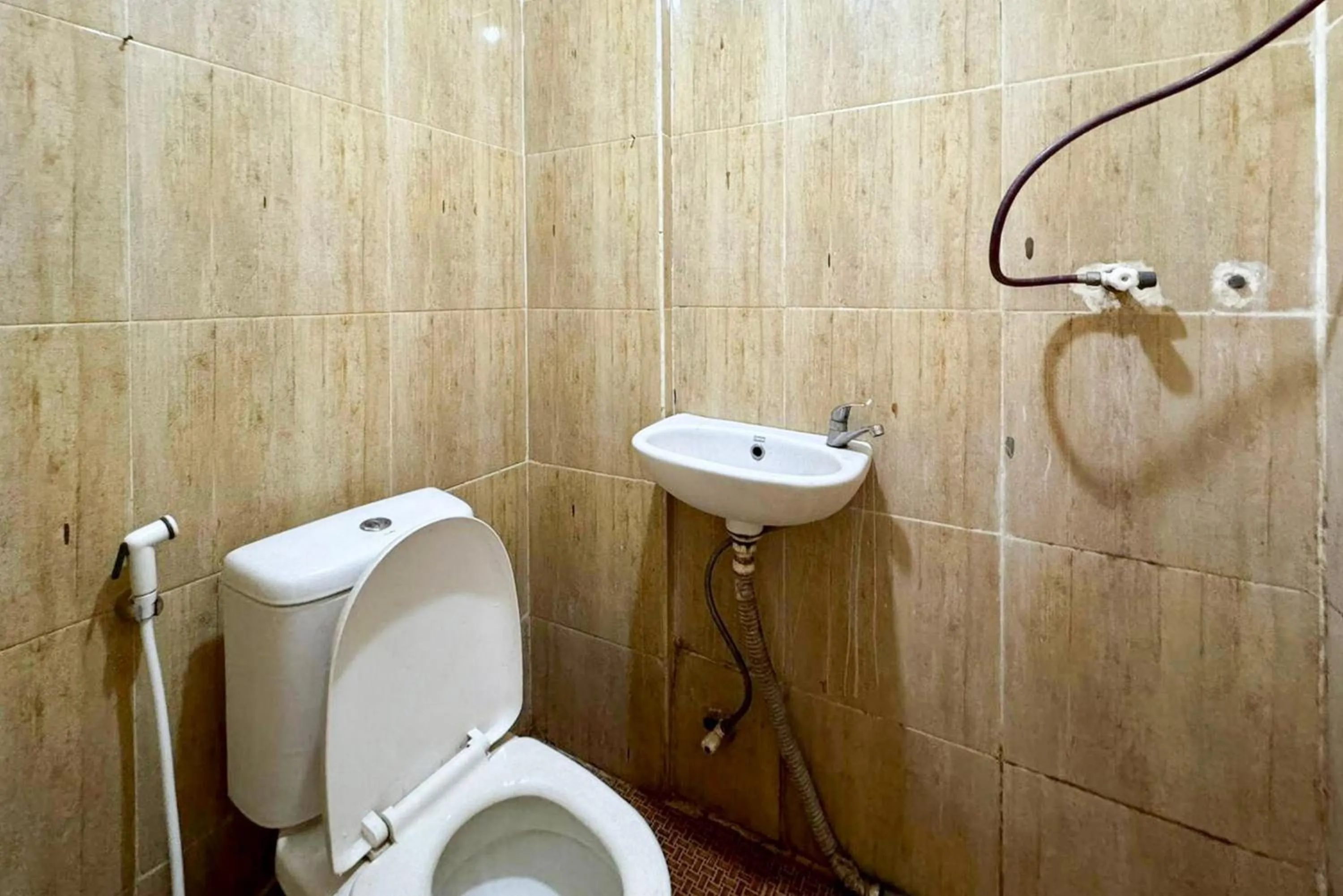 Bathroom in Backpacker Homestay Jatisampurna Redpartner