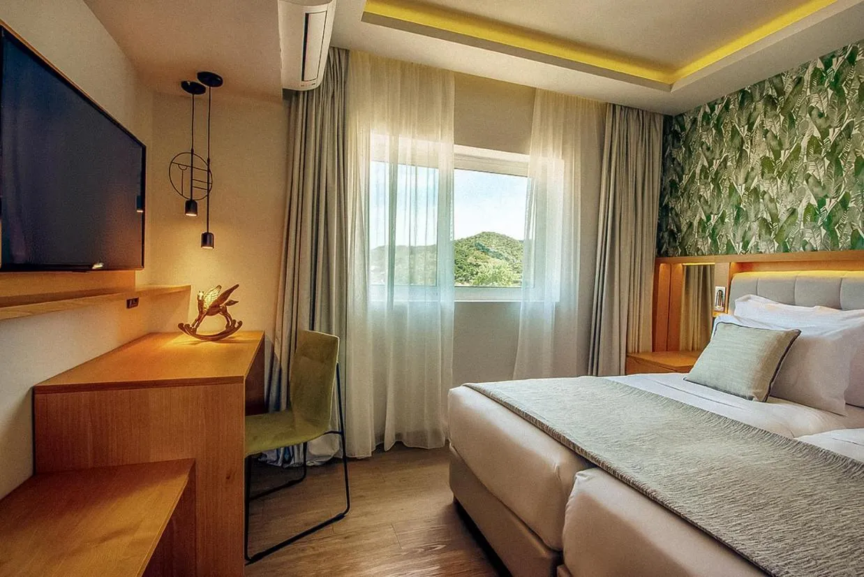 Bed in Zeus Dolce by Wyndham Athens