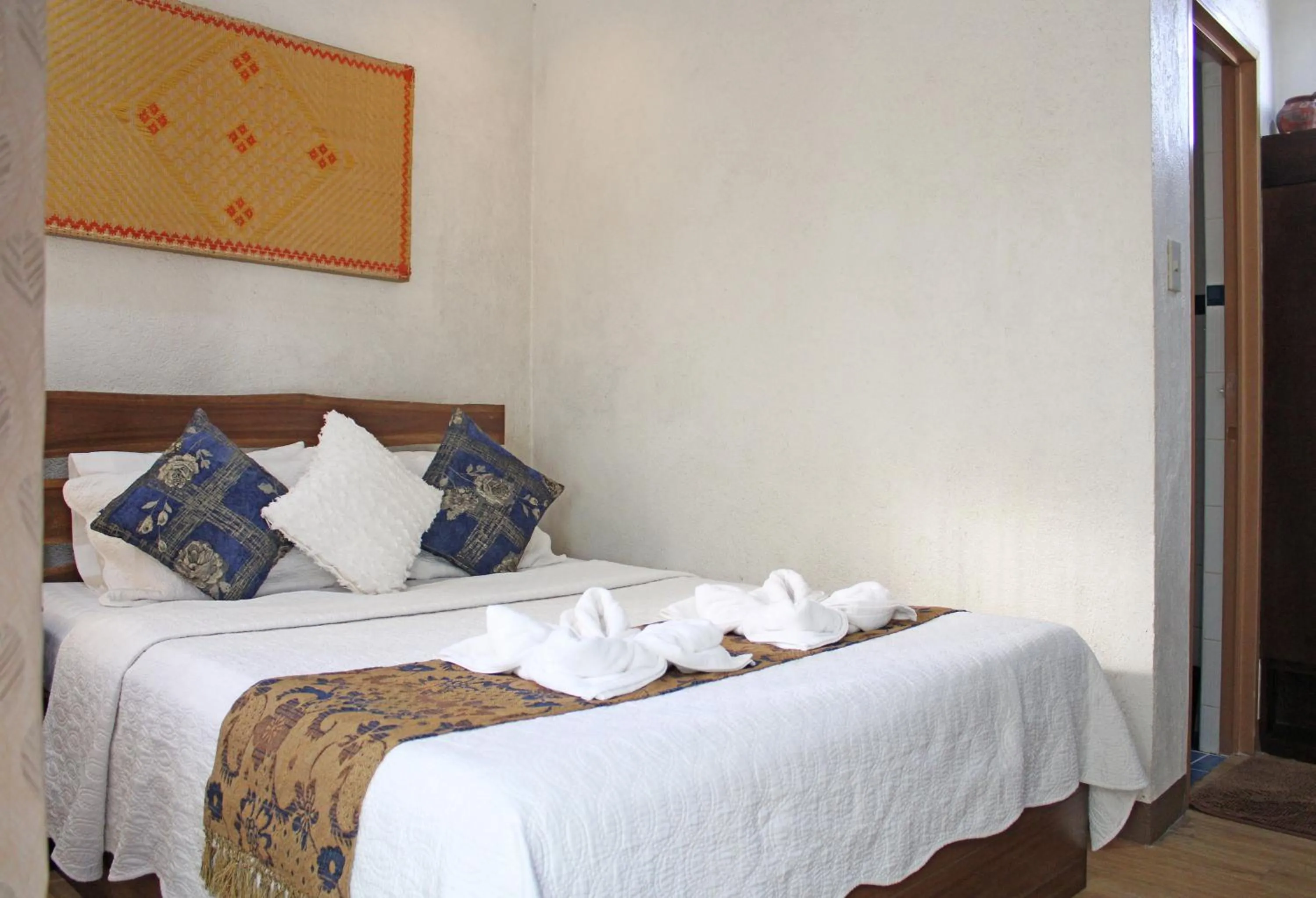 Bed in Balaibinda Lodge