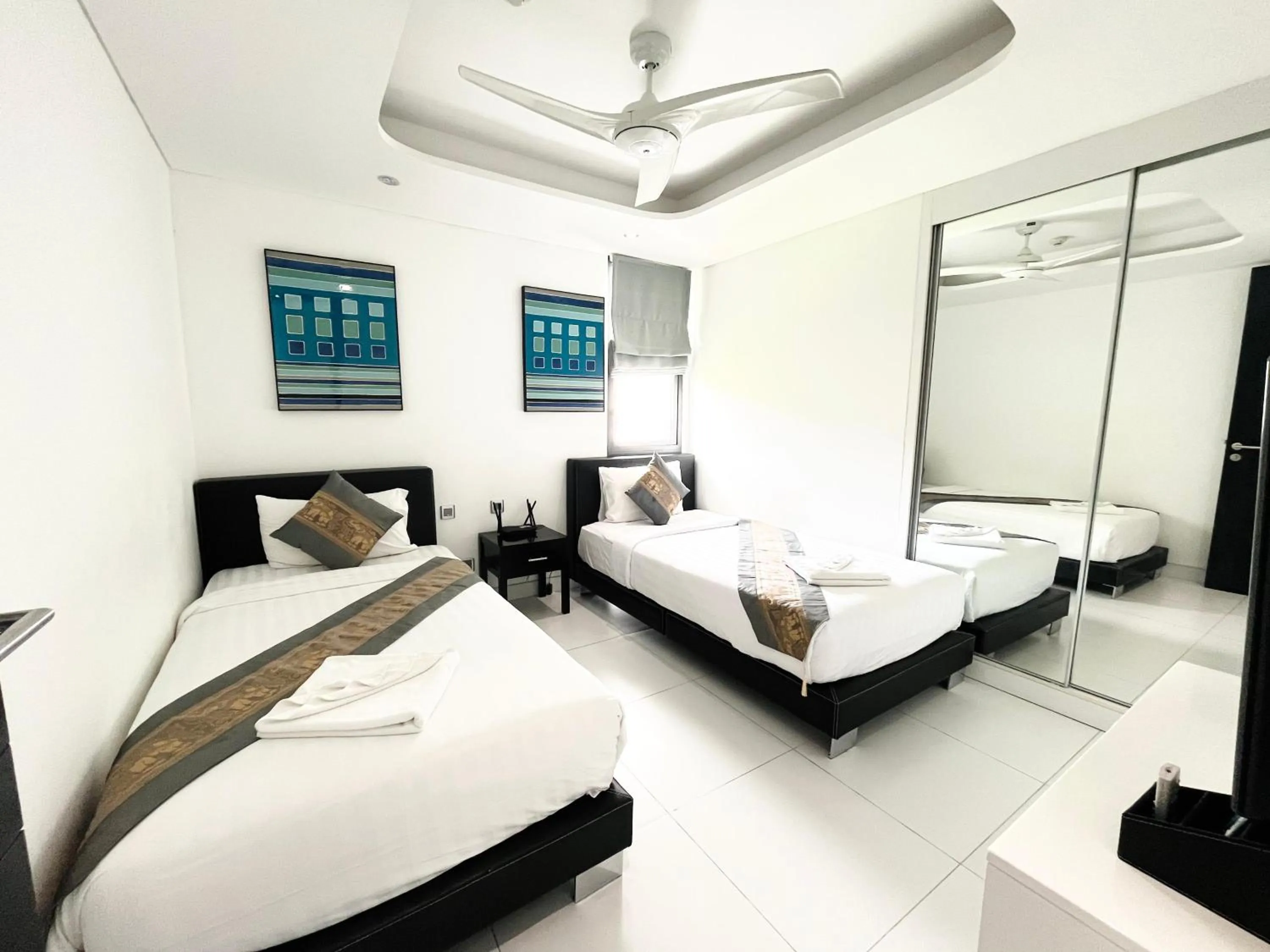 Bed in Twin Sands Resort Penthouse