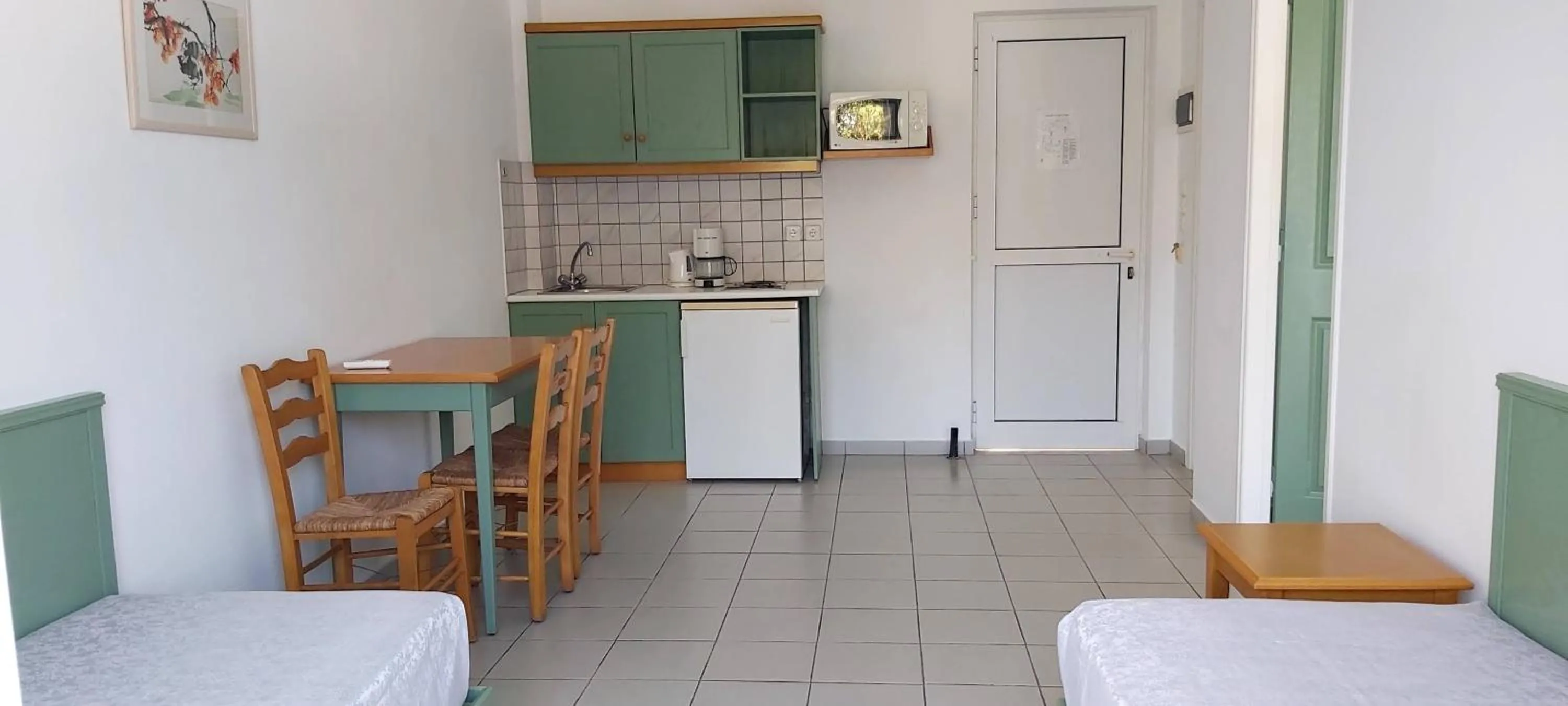 Kitchen or kitchenette in Andromeda Hotel Apartments