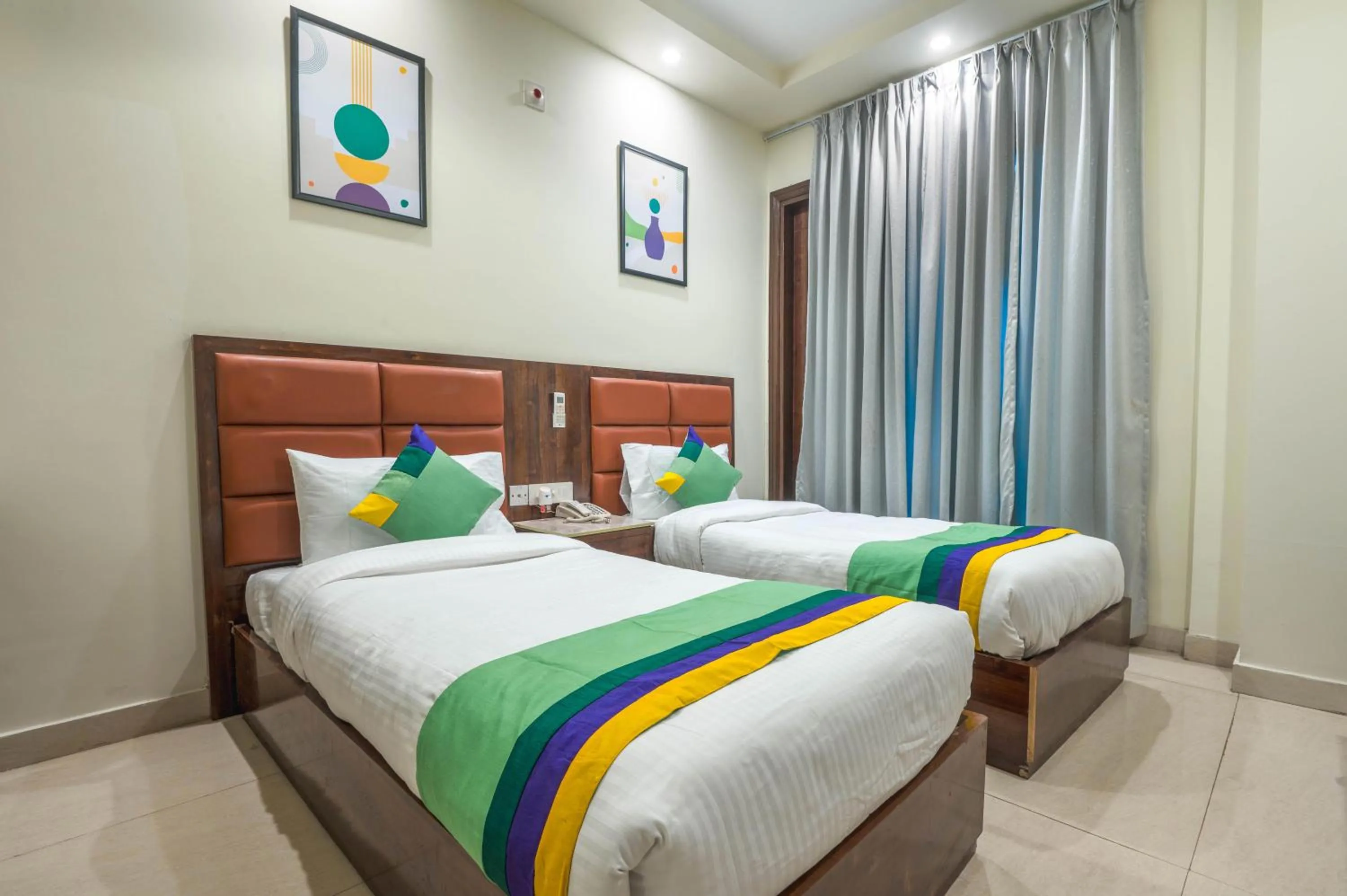 Bedroom, Bed in Treebo Sunny Feast