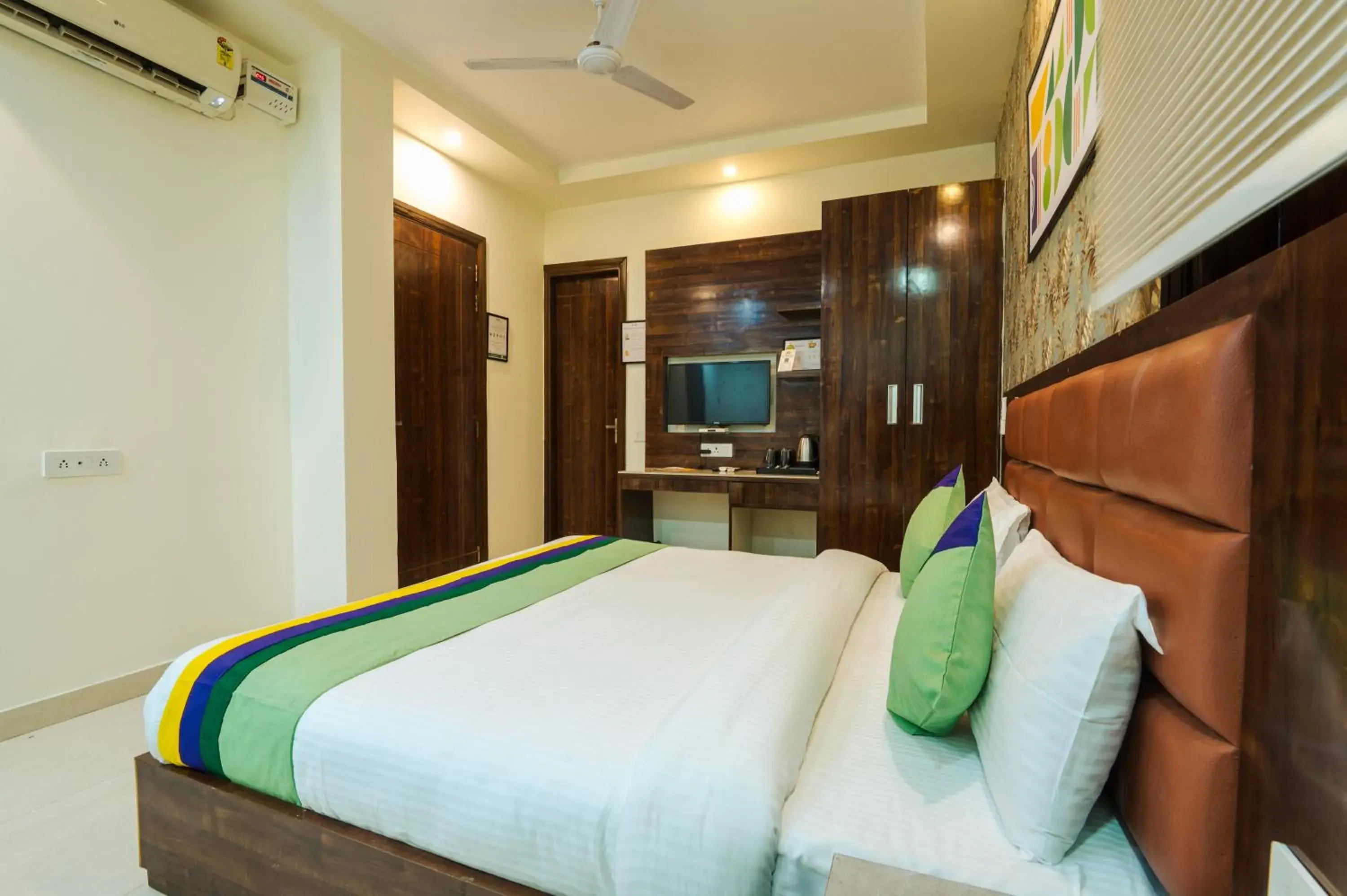 Bedroom, Bed in Treebo Sunny Feast Bedroom, Bed in Treebo Sunny Feast