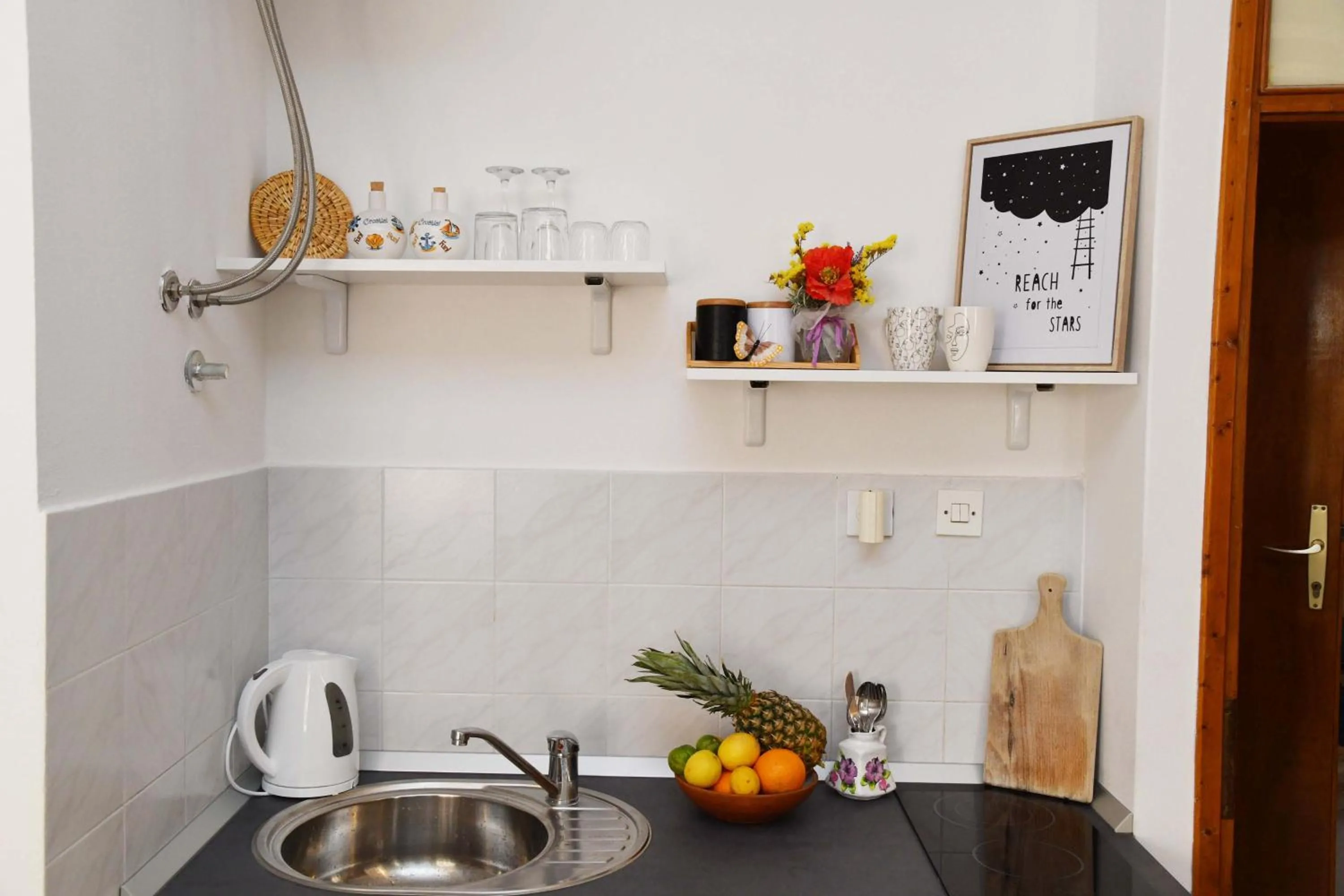 Kitchen or kitchenette in Apartments Mila