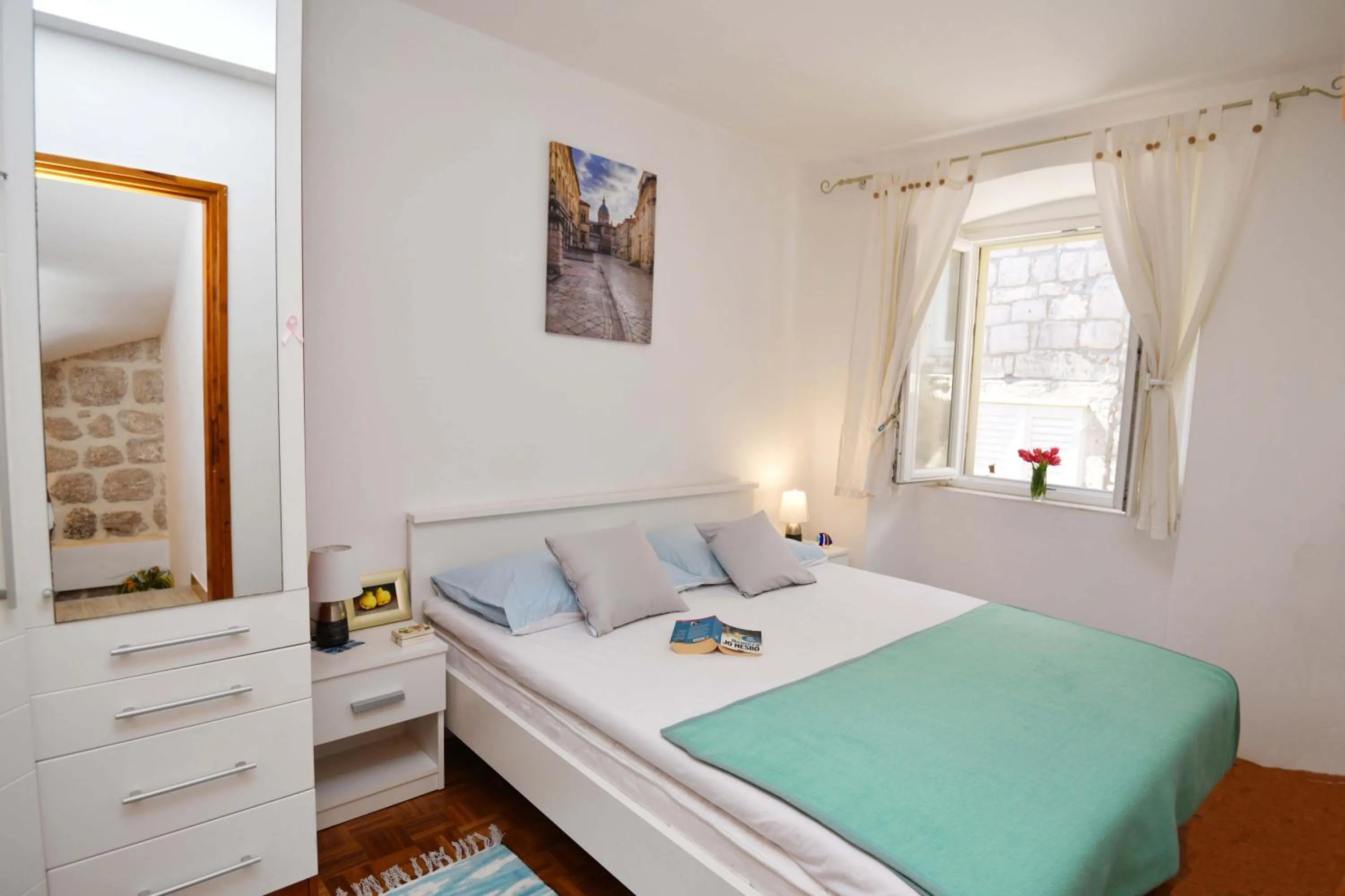 Bed in Apartments Mila