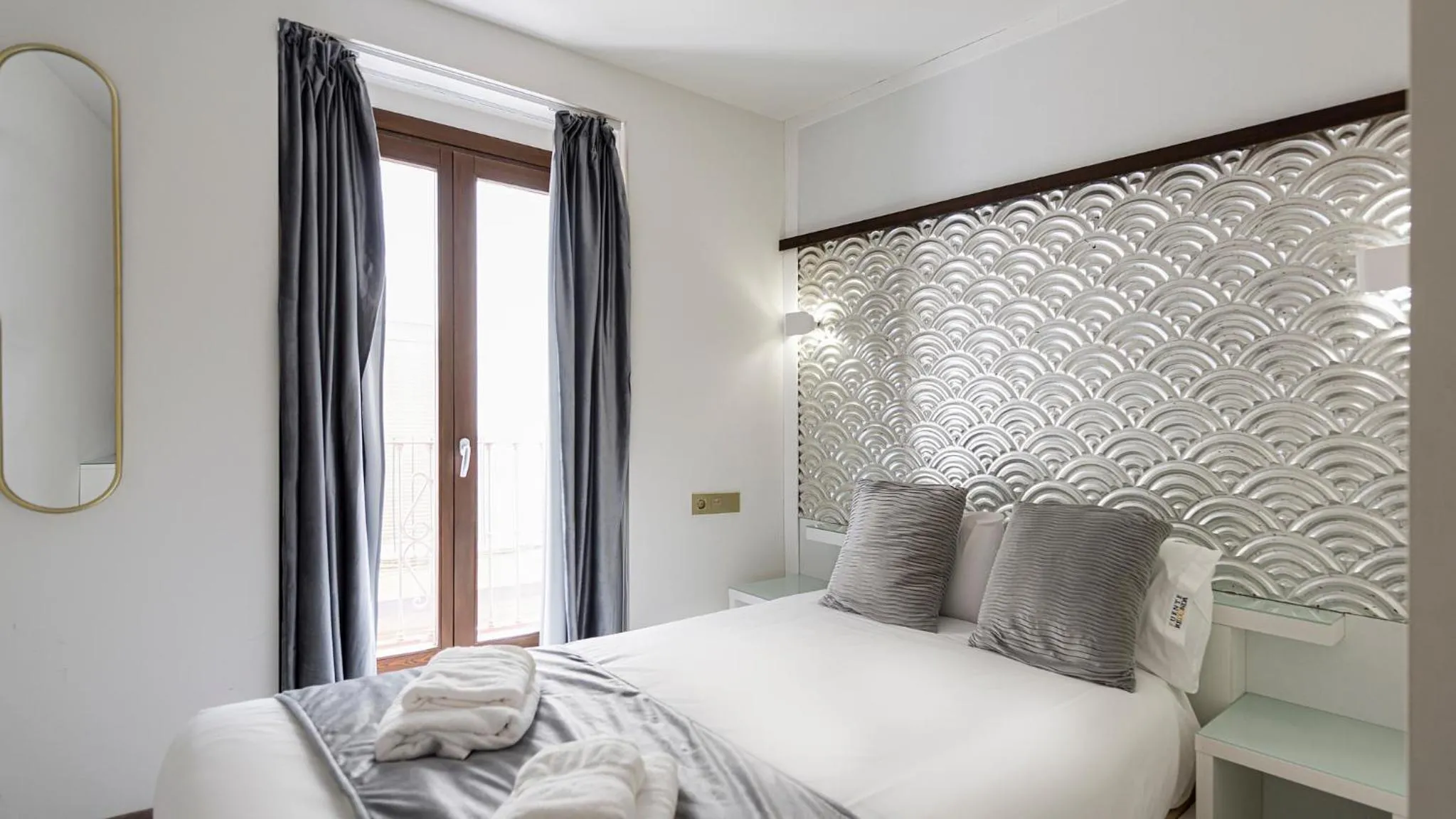 Bed in HOTEL FUENTE REDONDA LUXURY