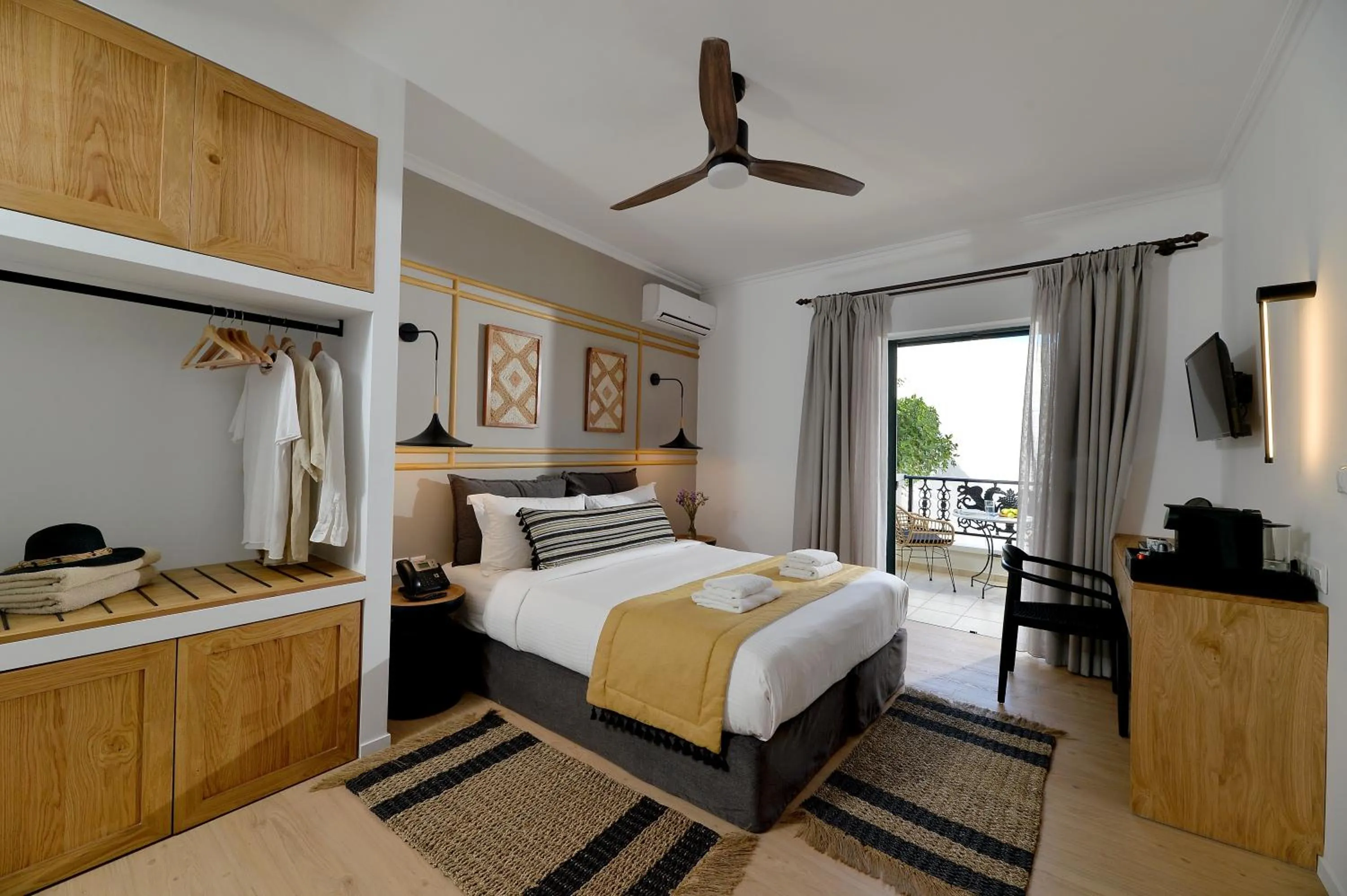 Photo of the whole room, Bed in Aktaion Beach Boutique Hotel & Spa