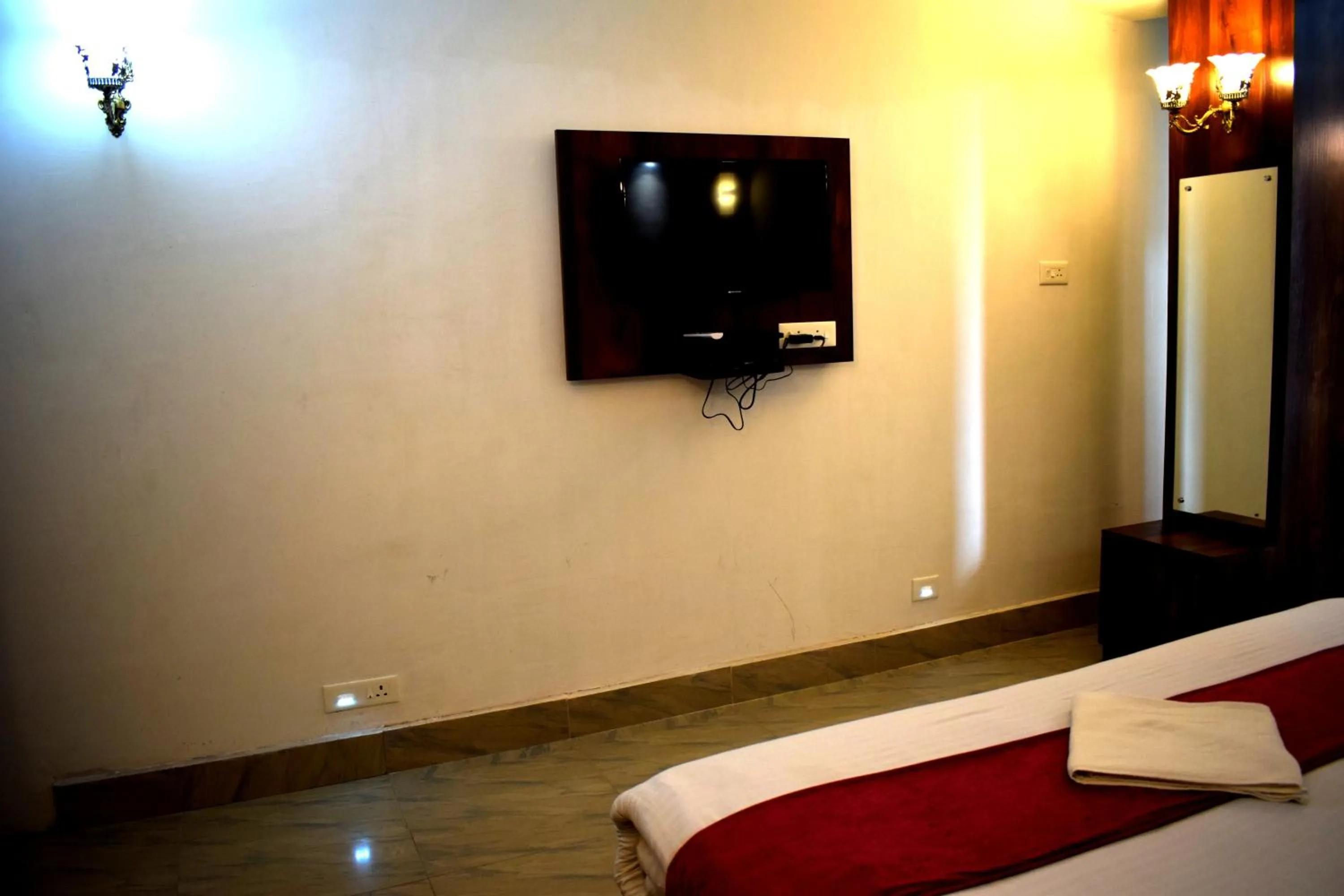 Bed in LILY GUEST HOUSE