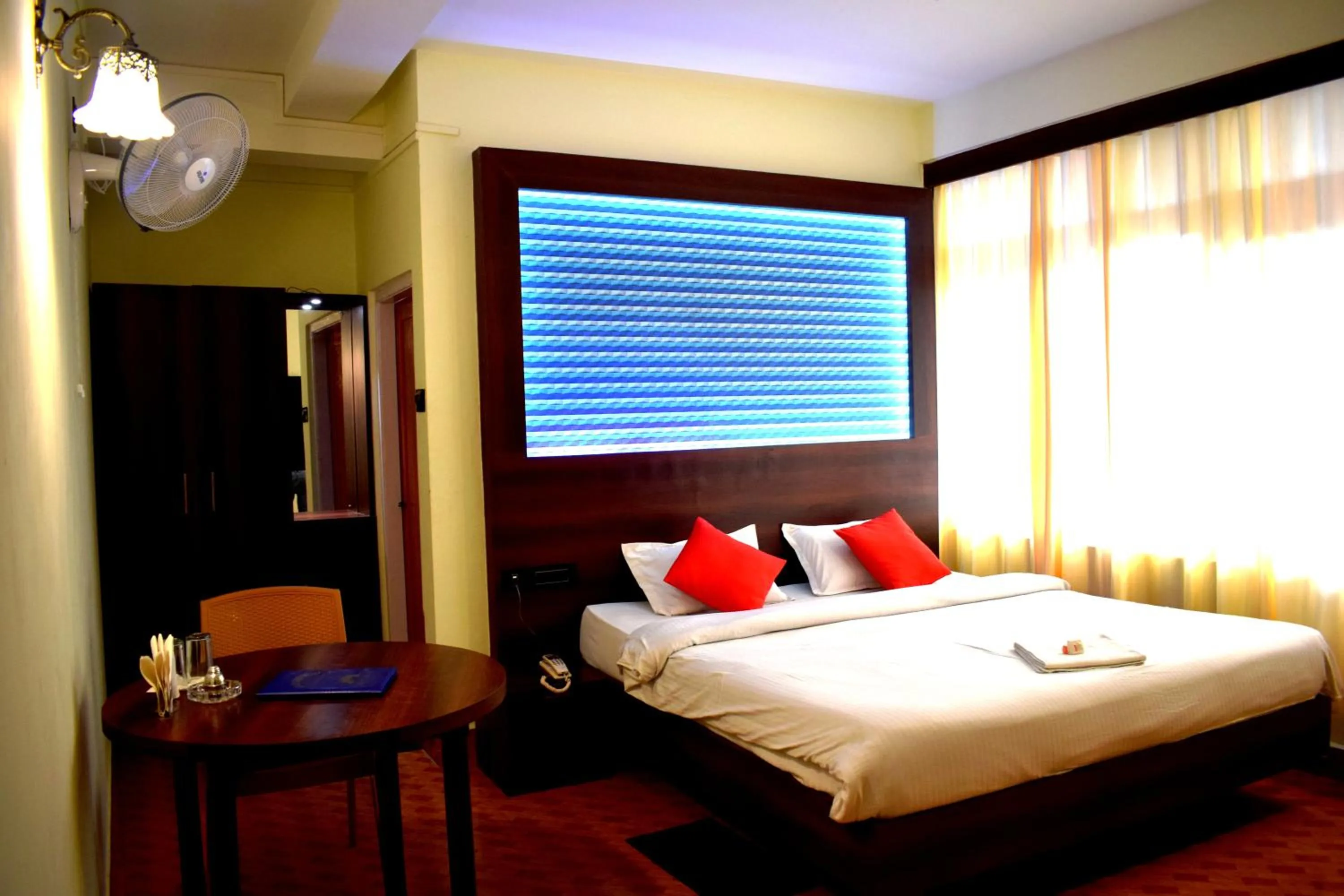 Bed in LILY GUEST HOUSE