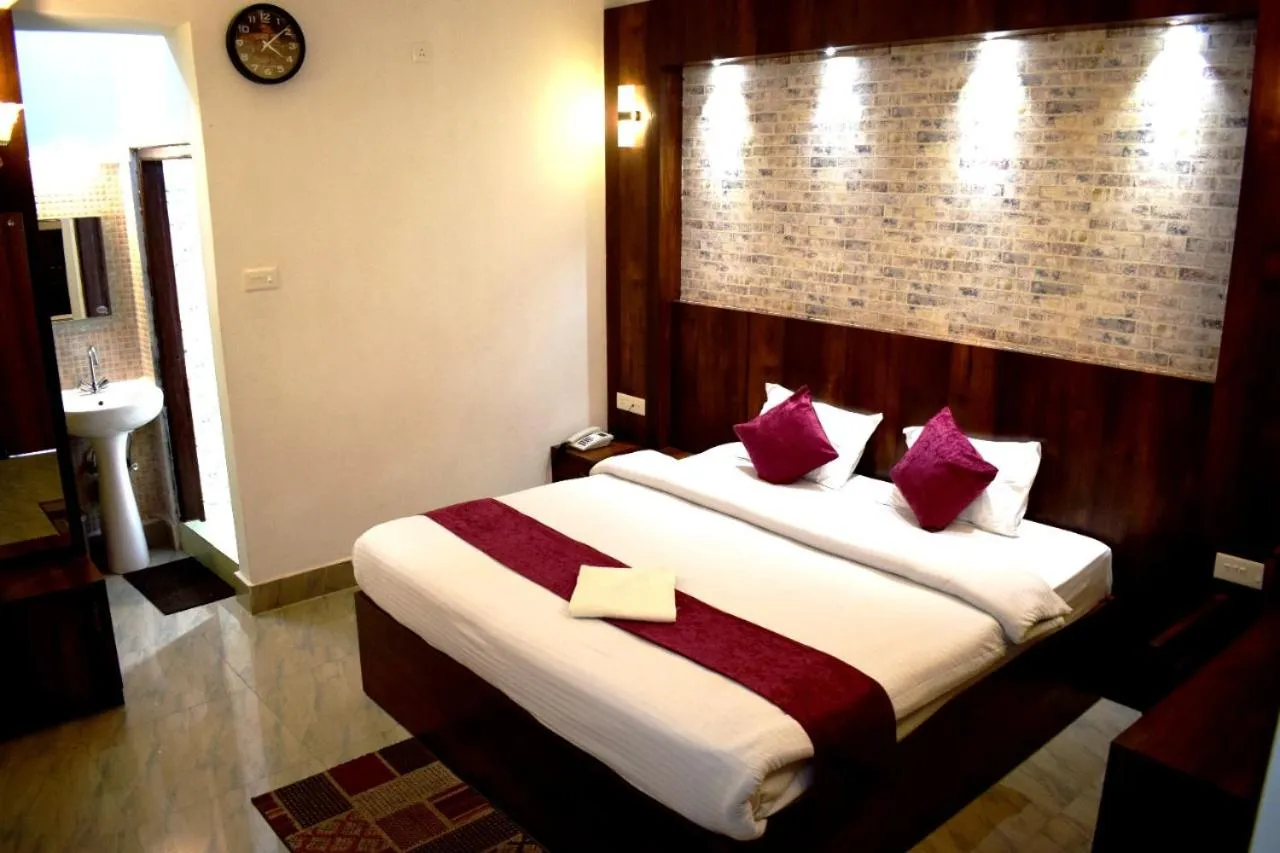 Bed in LILY GUEST HOUSE