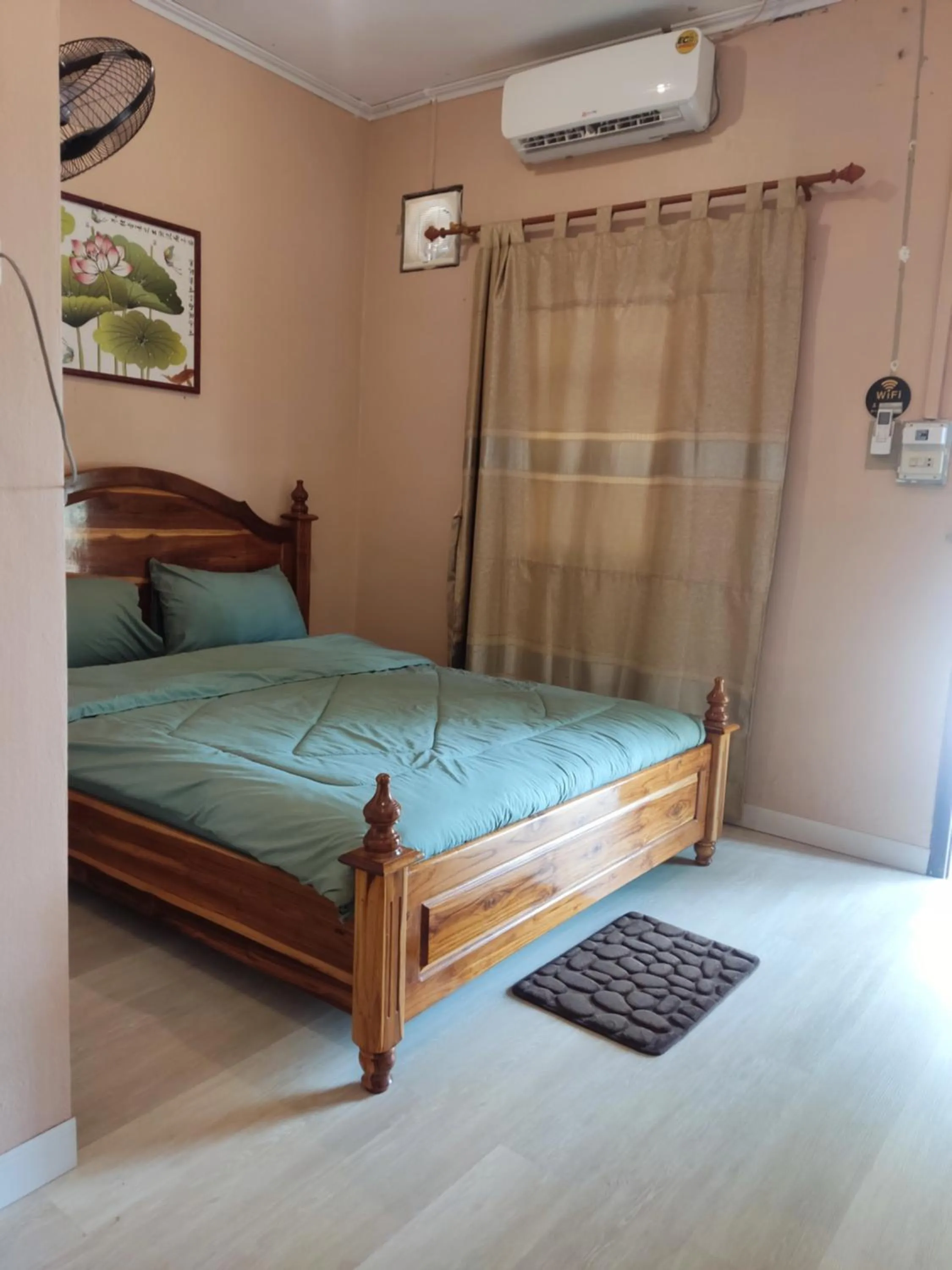 Bed in Erawan Guesthouse