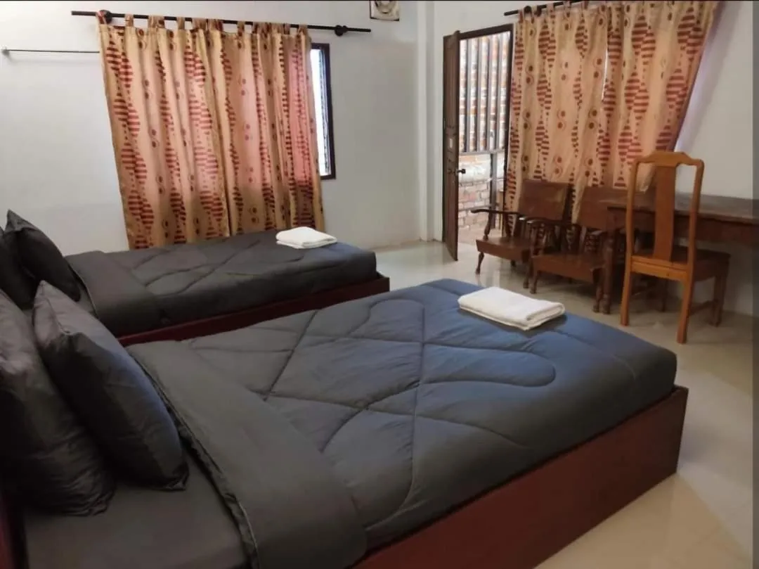 Bed in Erawan Guesthouse