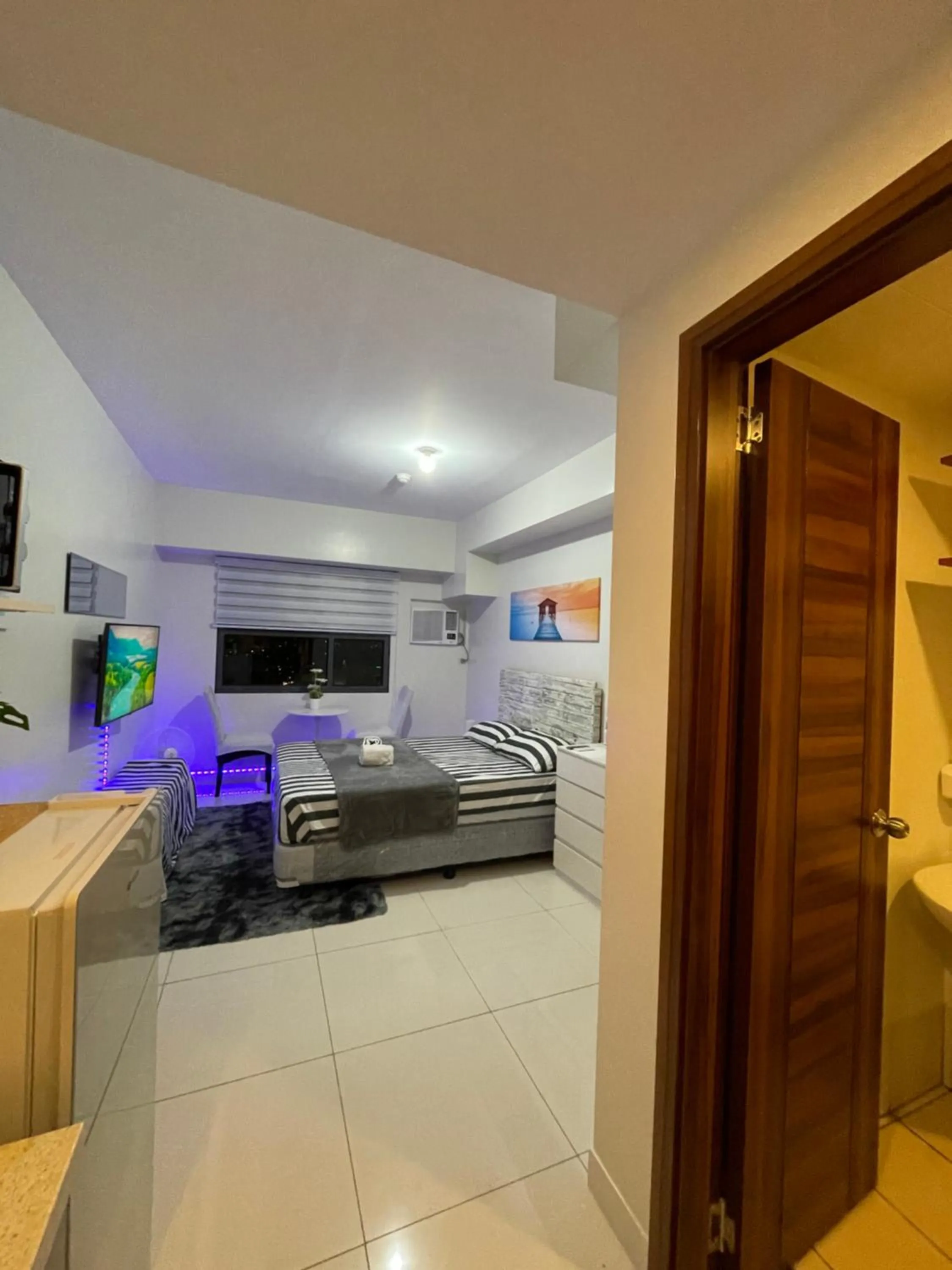 Bed in Cozy Studio at Horizon 101