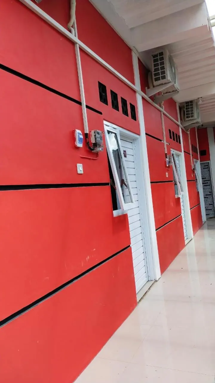 Property building in D'Ariska Rooms Homestay