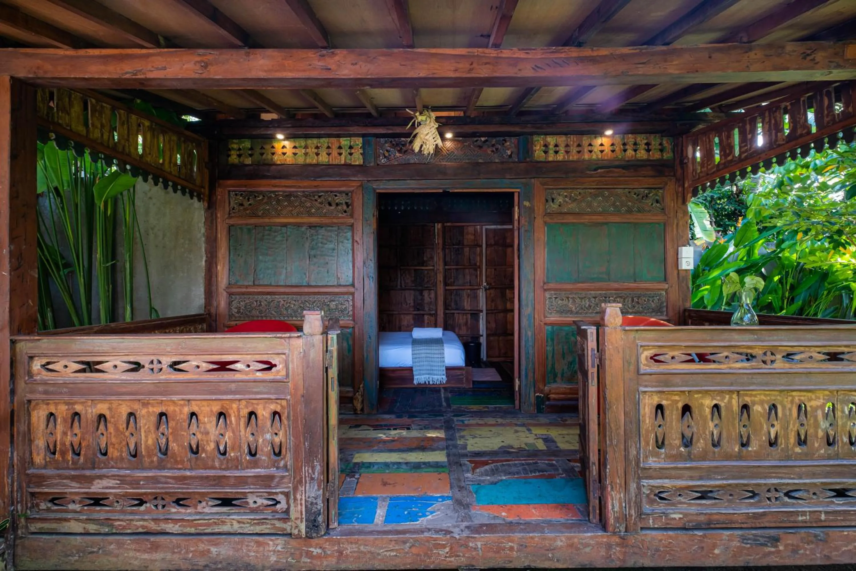 Seating area in Kubu Kirana by Supala