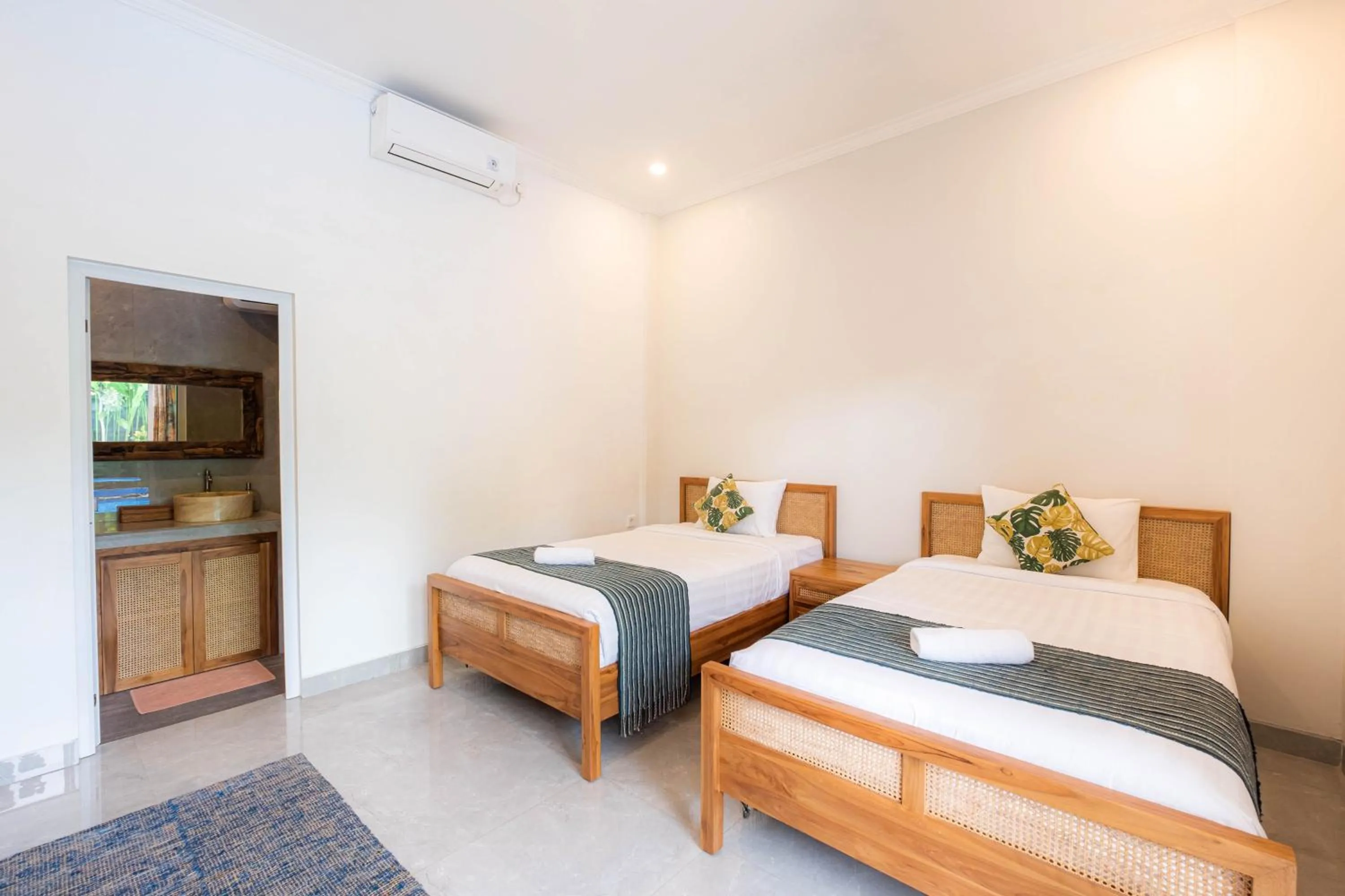 Photo of the whole room, Bed in Kubu Kirana by Supala