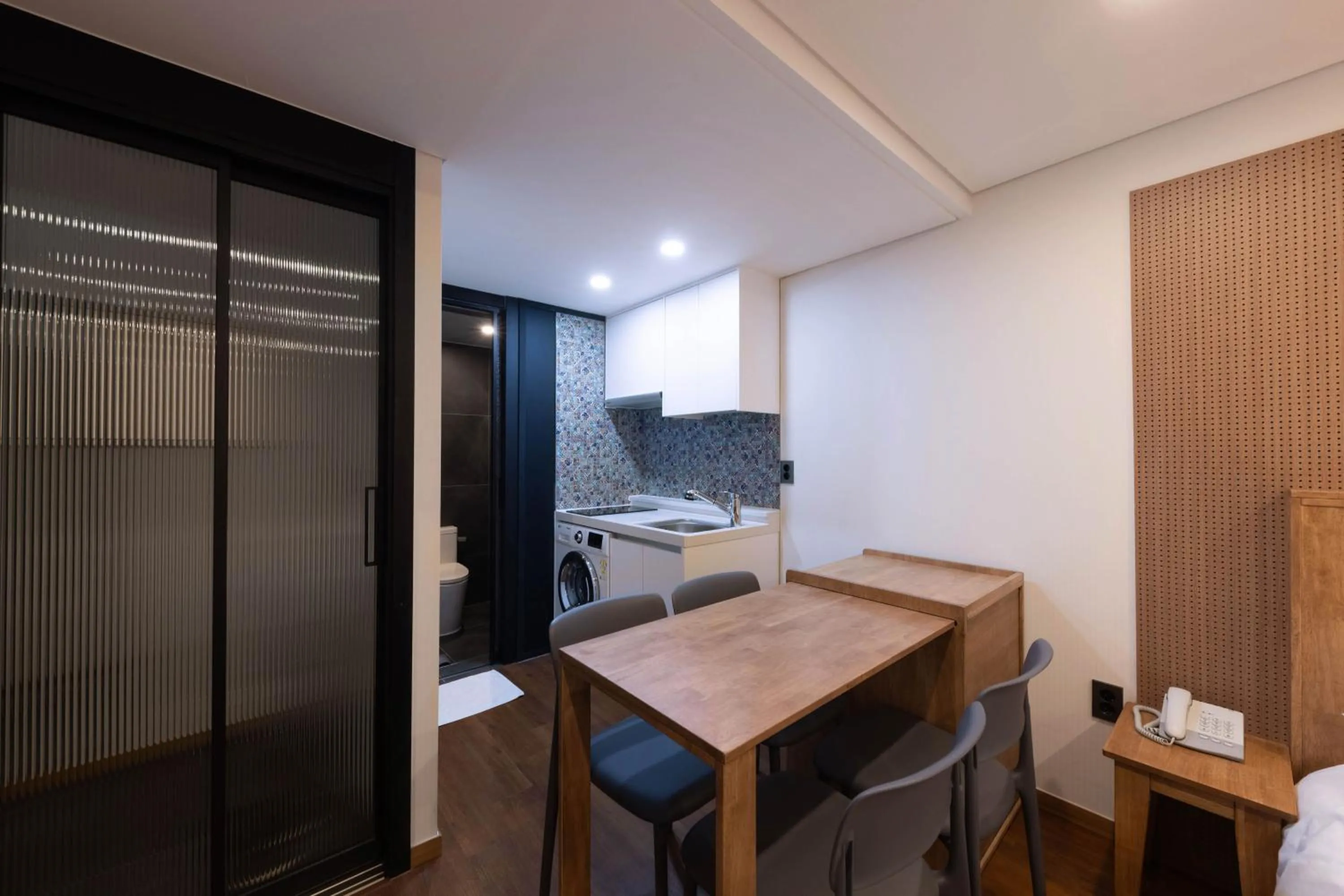 Kitchen or kitchenette in ARA Hotel