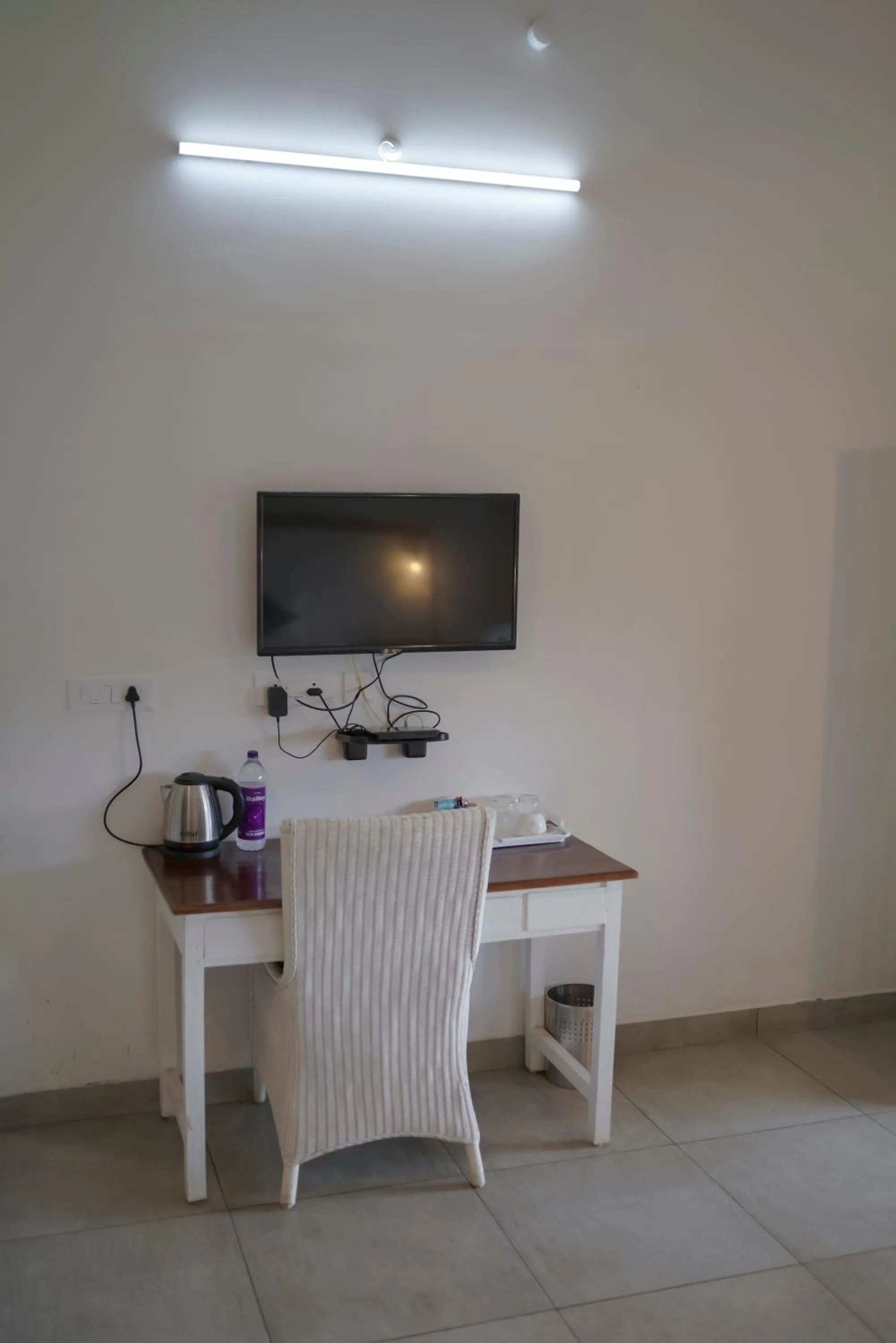 TV and multimedia in PEKOE Plantation Cottages by LexStays