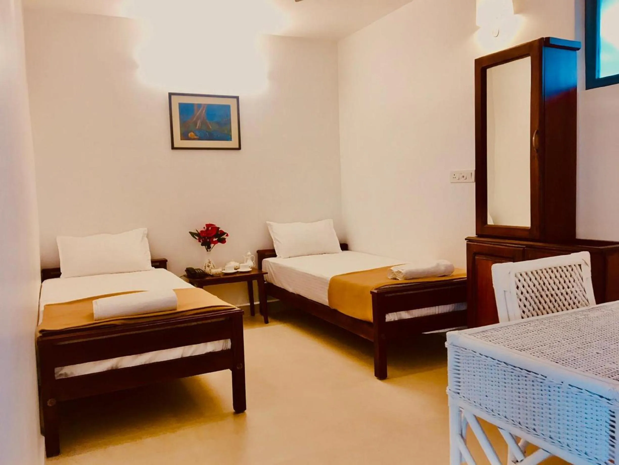 Bed in PEKOE Plantation Cottages by LexStays