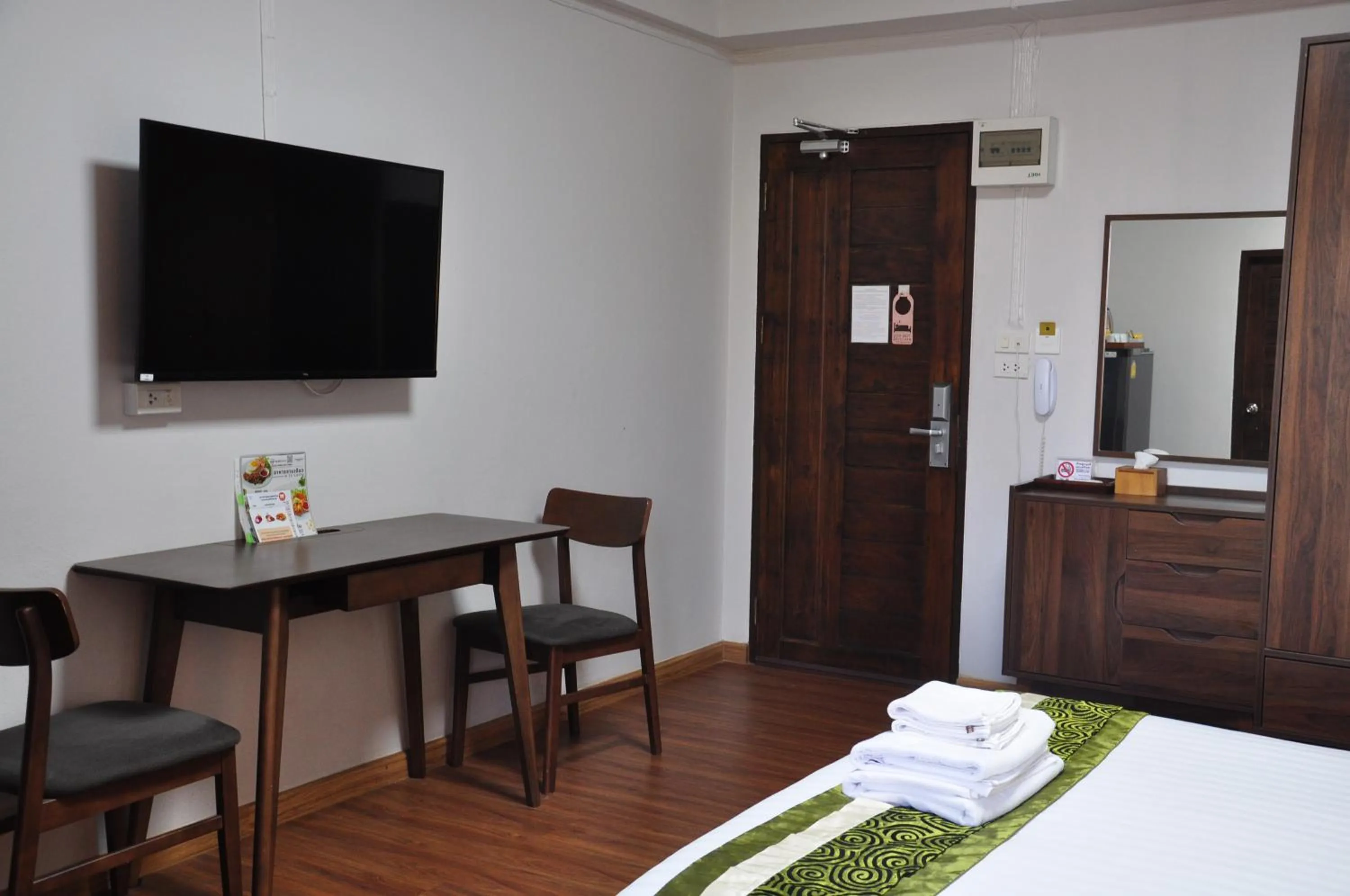 Bed in The Bedrooms Maeklong and Services Apartment