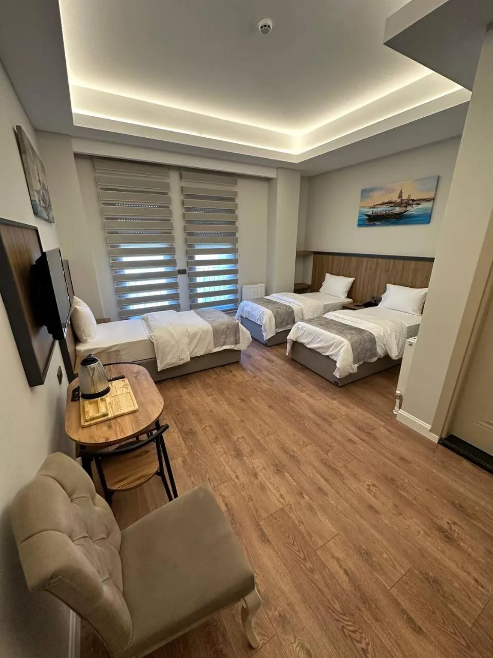 TV and multimedia, Bed in Akel Guest House