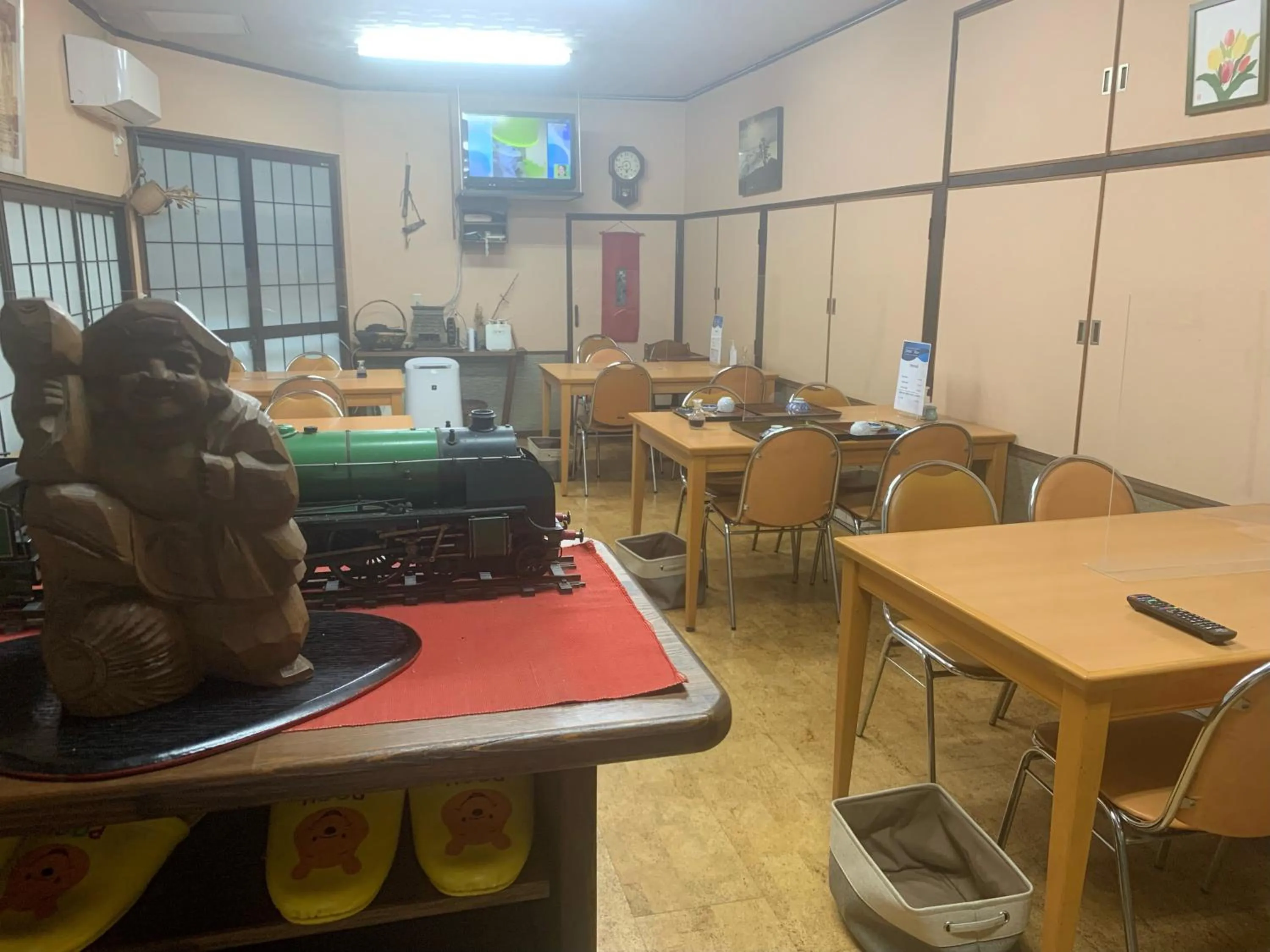 Communal lounge/ TV room in Iya Kankou Ryokan