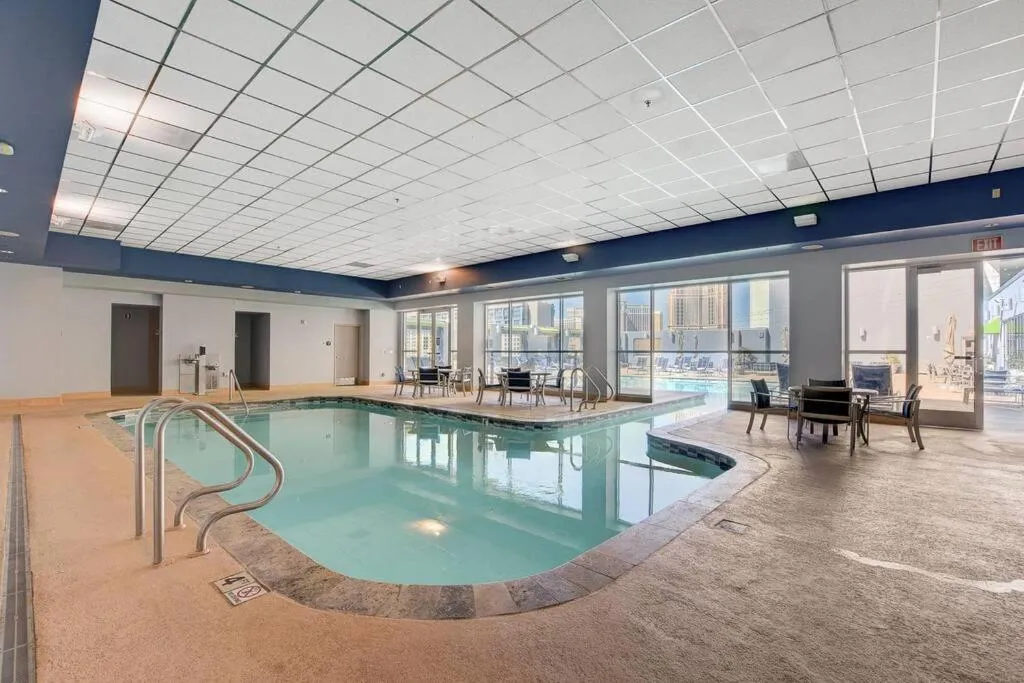 Day in Ultimate Las Vegas Getaway One Bedroom Suite with Balcony, Kitchen, Gym, Pool & Free Parking