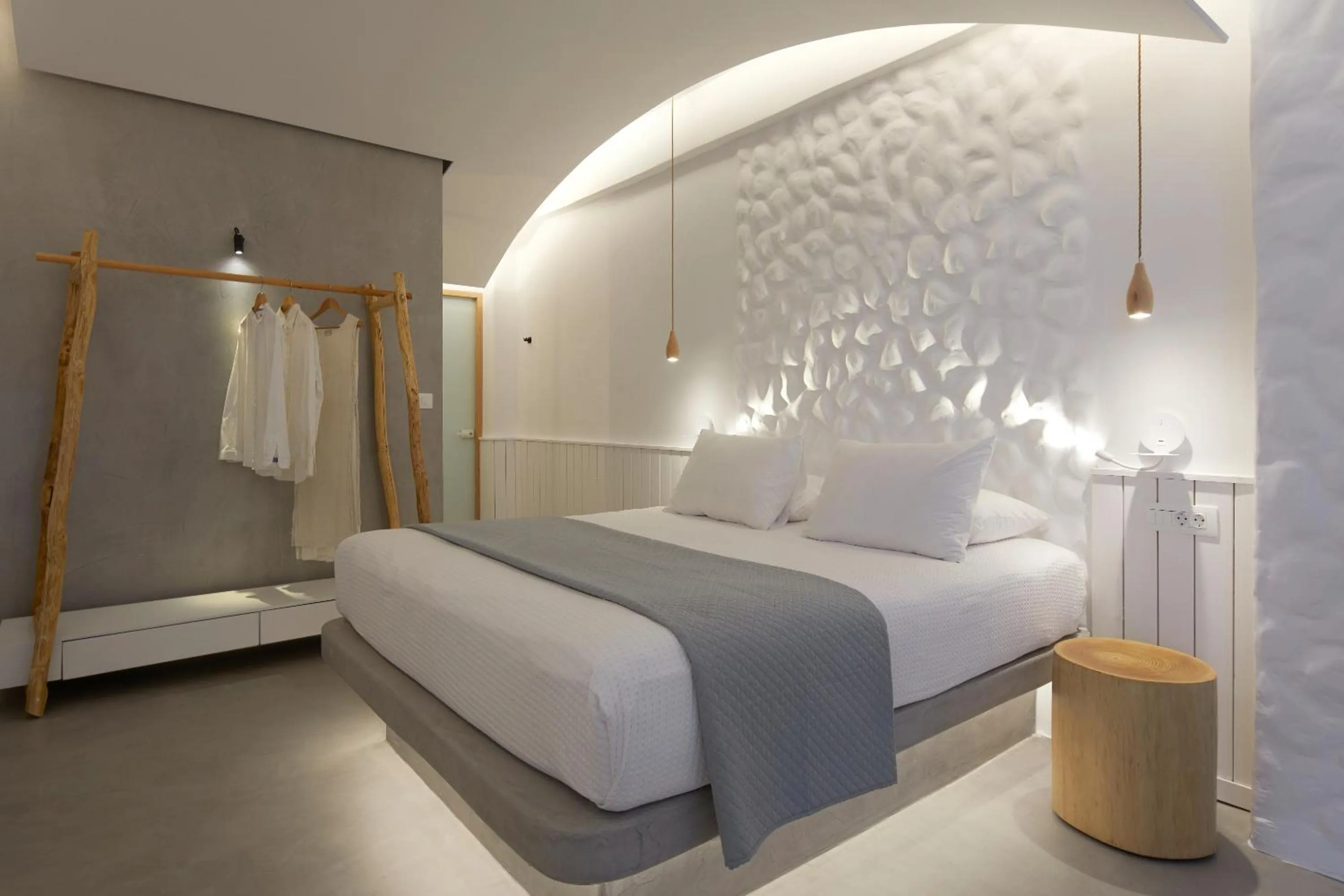 Bed in Oscar Beachfront Suites - Adults Only